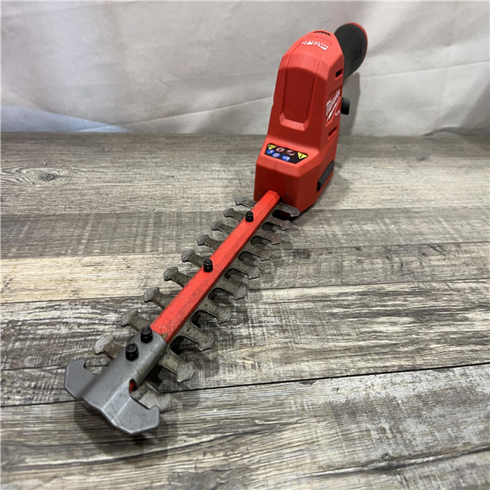 AS-IS Milwaukee FUEL 8 in. 12V Lithium-Ion Brushless Cordless Battery Hedge Trimmer (Tool-Only)