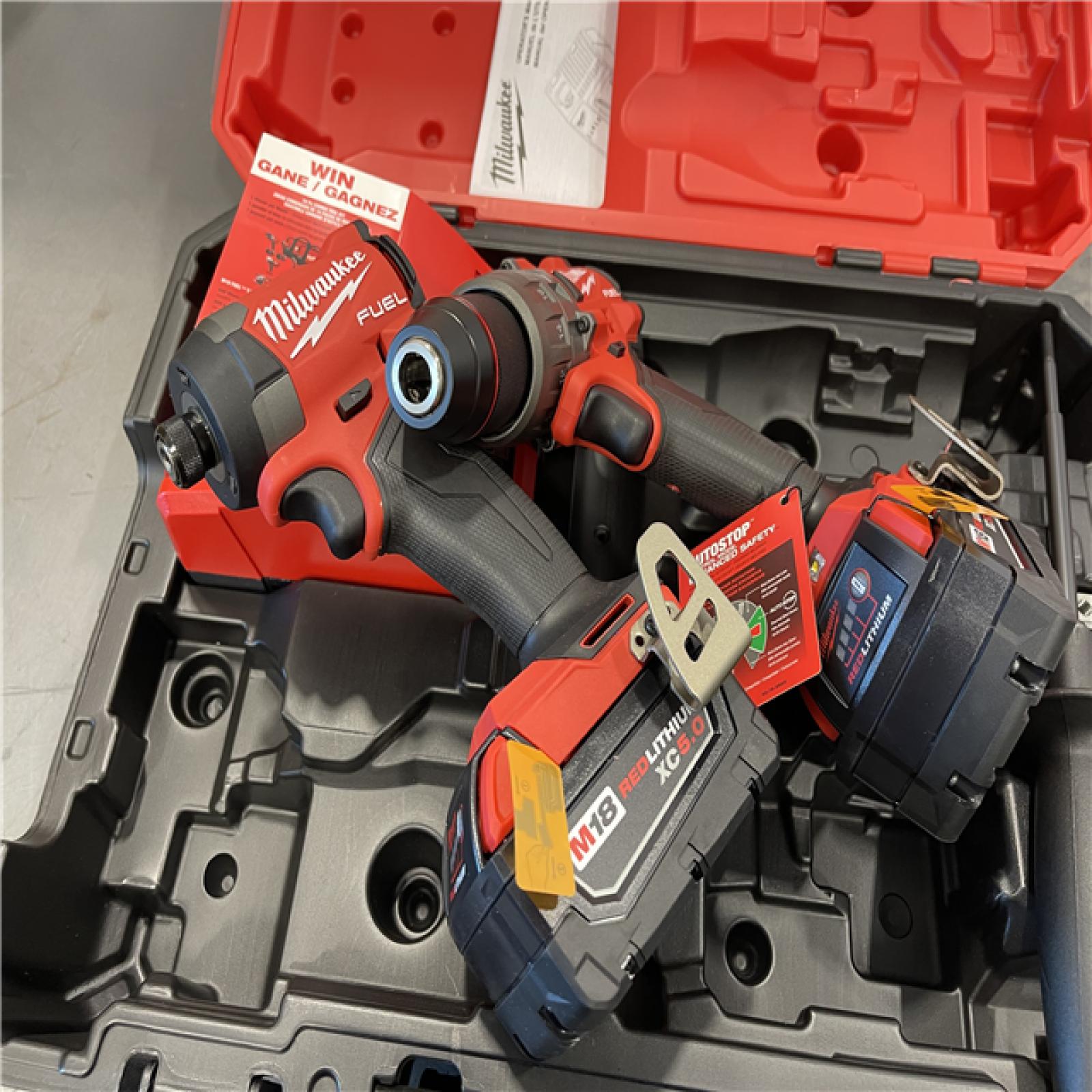 AS-IS - Milwaukee M18 FUEL 18V Lithium-Ion Brushless Cordless Hammer Drill and Impact Driver Combo Kit