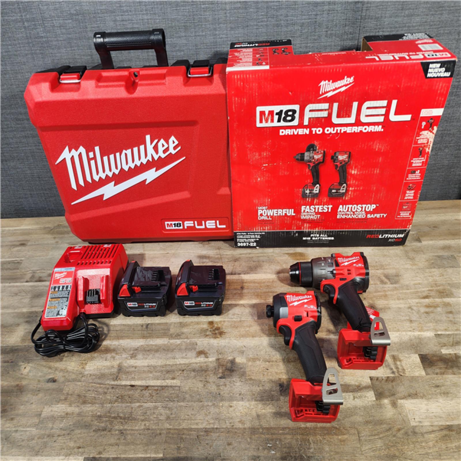HOUSTON LOCATION - AS-IS (APPEARS LIKE NEW) MILWAUKEE FUEL 18V Lithium-Ion Brushless Cordless Hammer Drill and Impact Driver Combo Kit (2-Tool) with 2 Batteries
