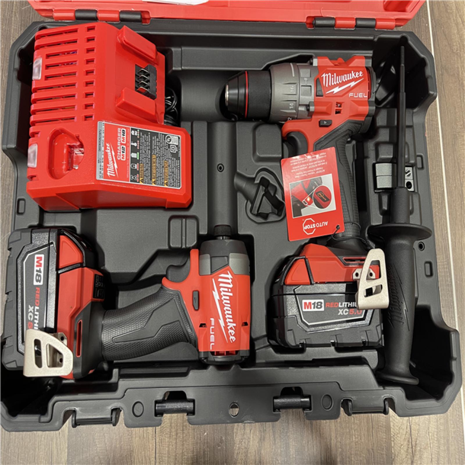 AS-IS- Milwaukee FUEL 18V Lithium-Ion Brushless Cordless Hammer Drill and Impact Driver Combo Kit
