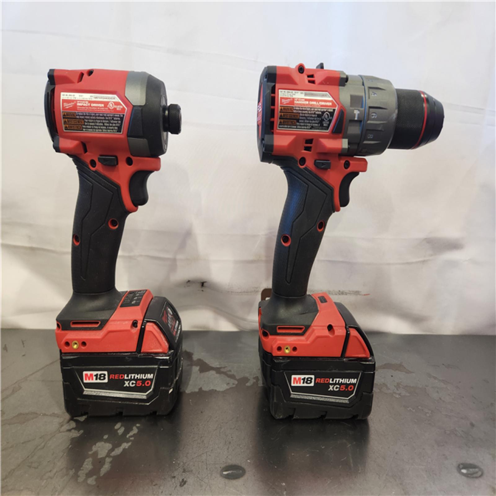 AS-IS- Milwaukee FUEL 18V Lithium-Ion Brushless Cordless Hammer Drill and Impact Driver Combo Kit