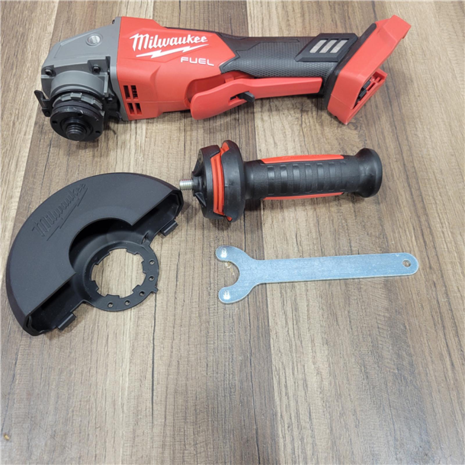 AS-IS Milwaukee 2880-20 M18 FUEL 18-Volt Lithium-Ion Brushless Cordless 4-1/2 in./5 in. Grinder W/Paddle Switch (Tool-Only)