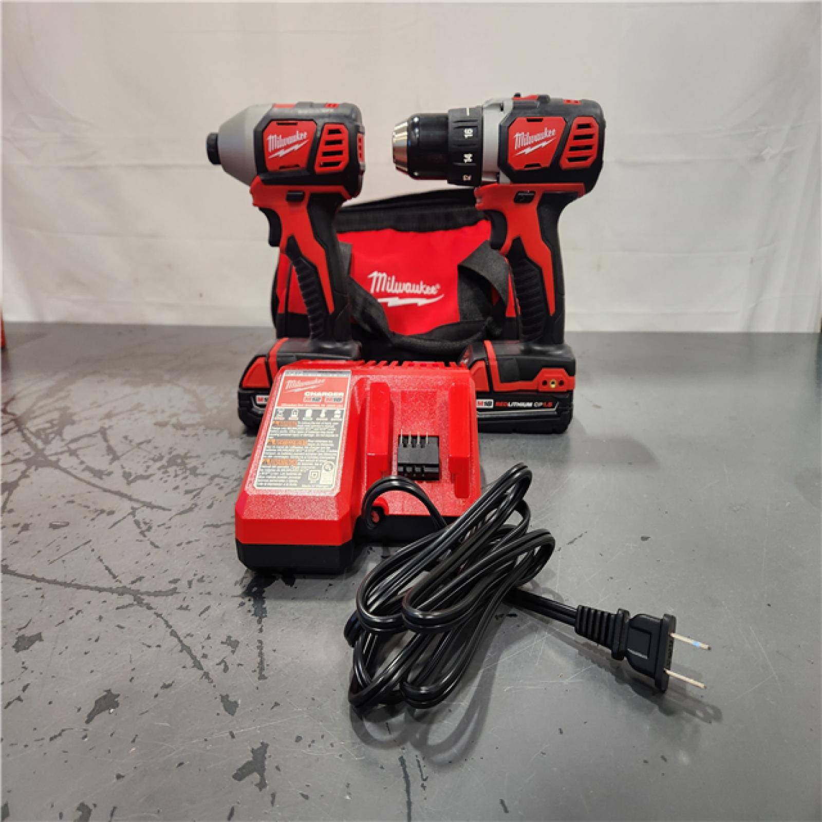 AS-IS- Milwaukee 18V Cordless Brushed 2-Tool Drill/Driver and Impact Driver Kit