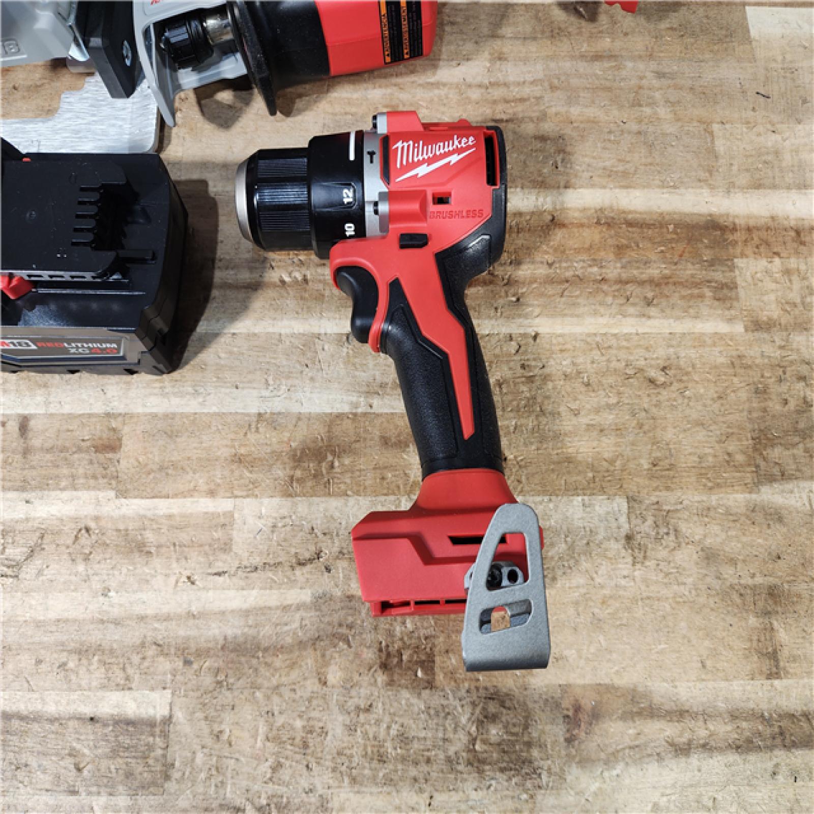 HOUSTON LOCATION - AS - IS Milwaukee 3 Tool Combo Kit W/ (2) Battery & Charger