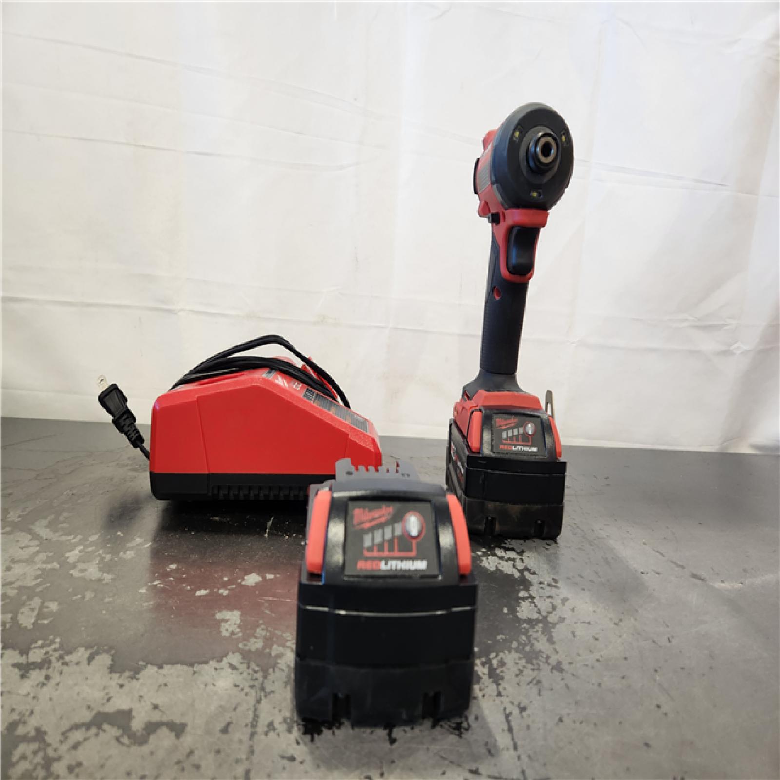 AS-IS- Milwaukee 18-Volt Lithium-Ion XC Starter Kit with Two 5.0Ah Batteries and Charger