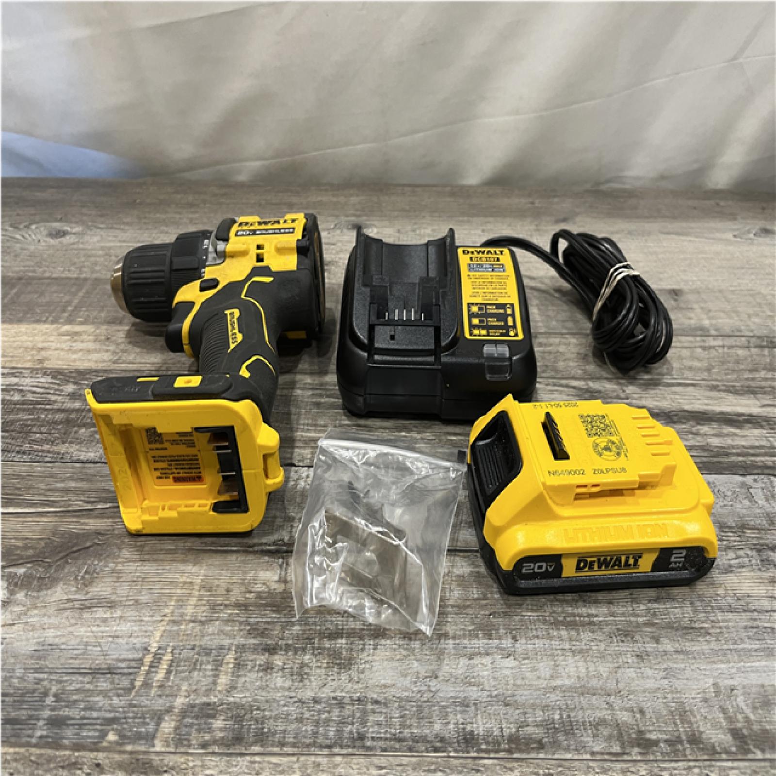 AS-IS DEWALT Atomic 20V Lithium-Ion Cordless Compact 1/2 in. Drill/Driver Kit