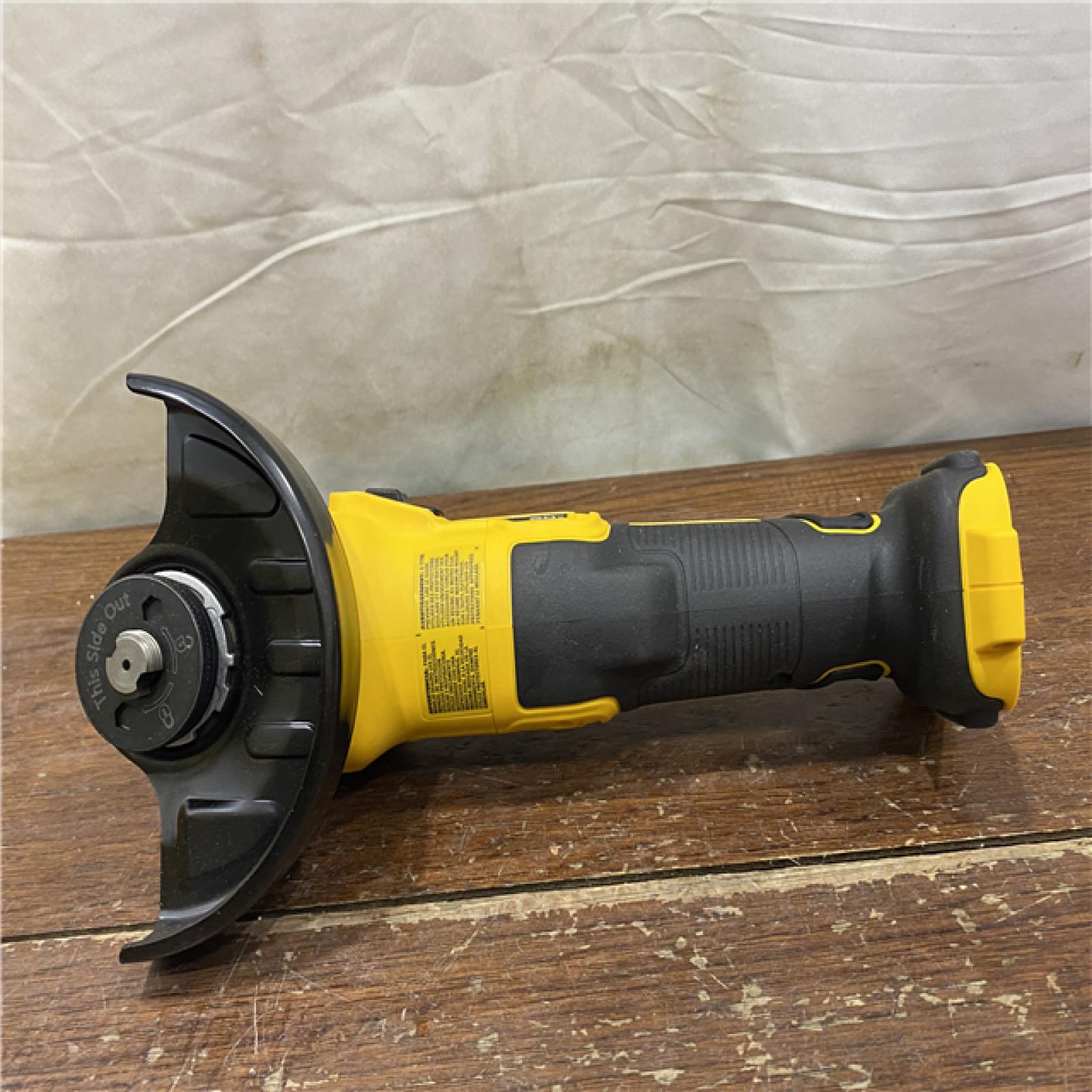 AS-IS DeWalt DCG405B 20V Max XR 4.5-Inch Slide Switch Small Angle Grinder (Tool Only)