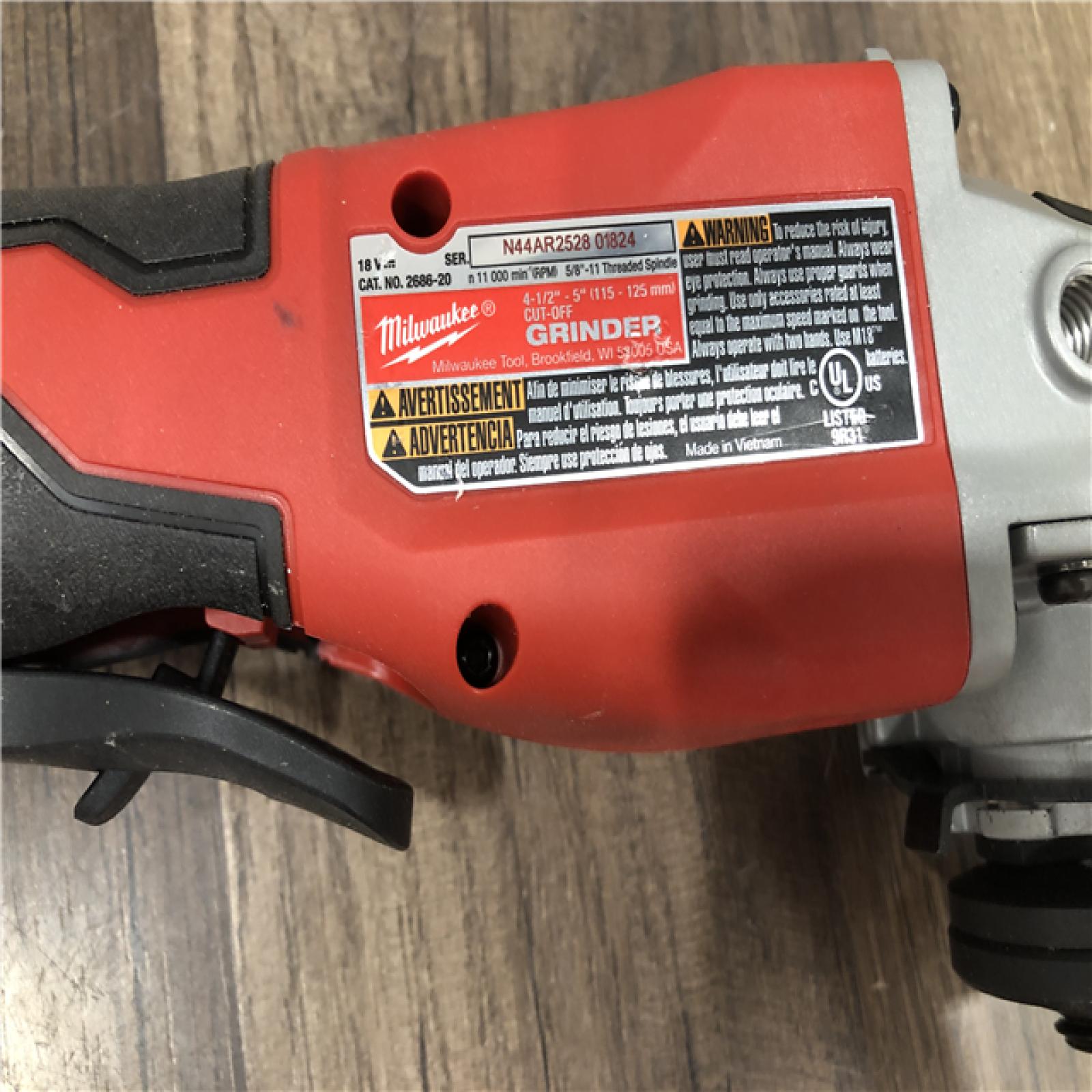 AS-IS Milwaukee 18V Lithium-Ion Brushless Cordless 4-1/2 in./5 in. Grinder w/Paddle Switch (Tool-Only)