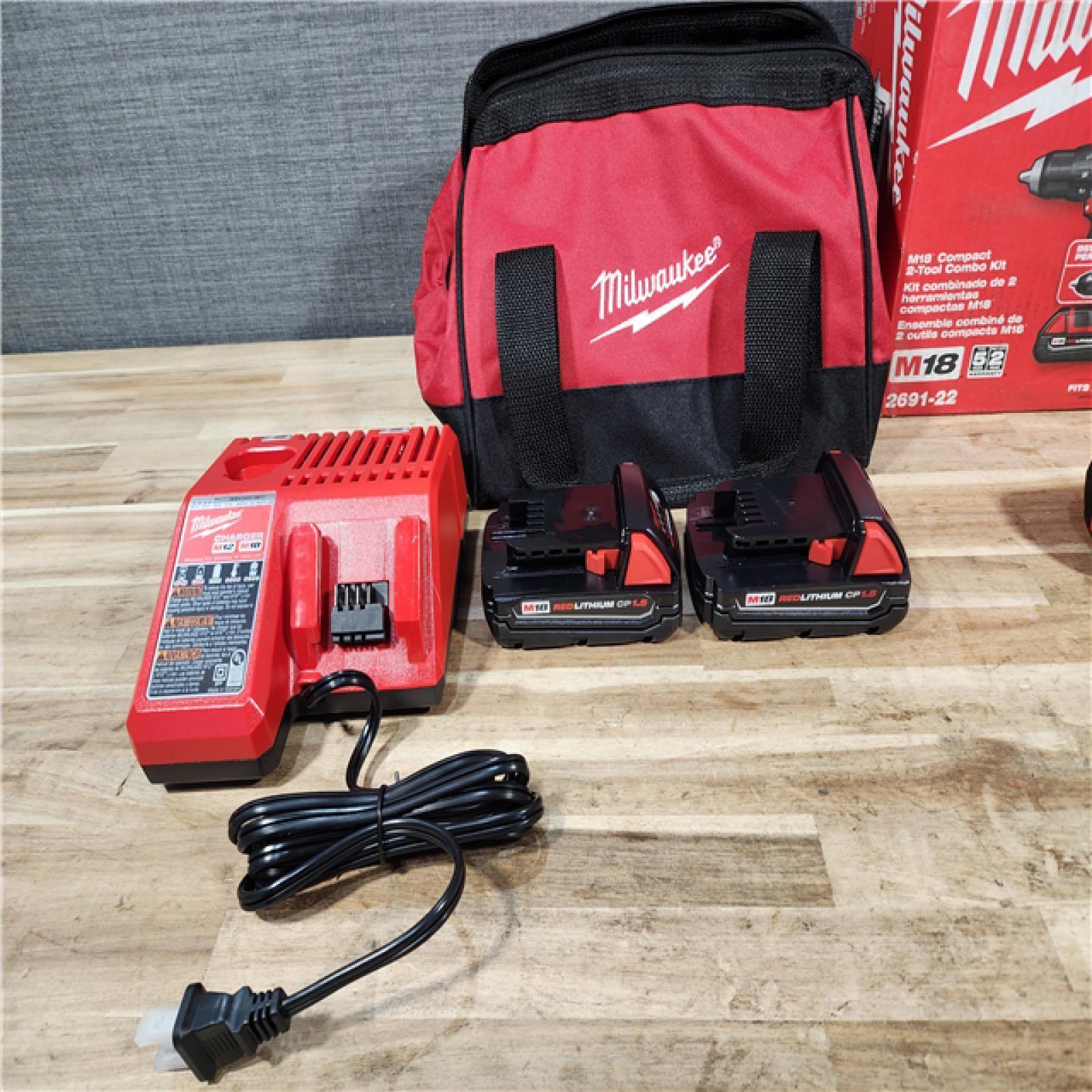 HOUSTON LOCATION - AS-IS Milwaukee M18 18V Lithium-Ion Cordless Drill Driver/Impact Driver Combo Kit