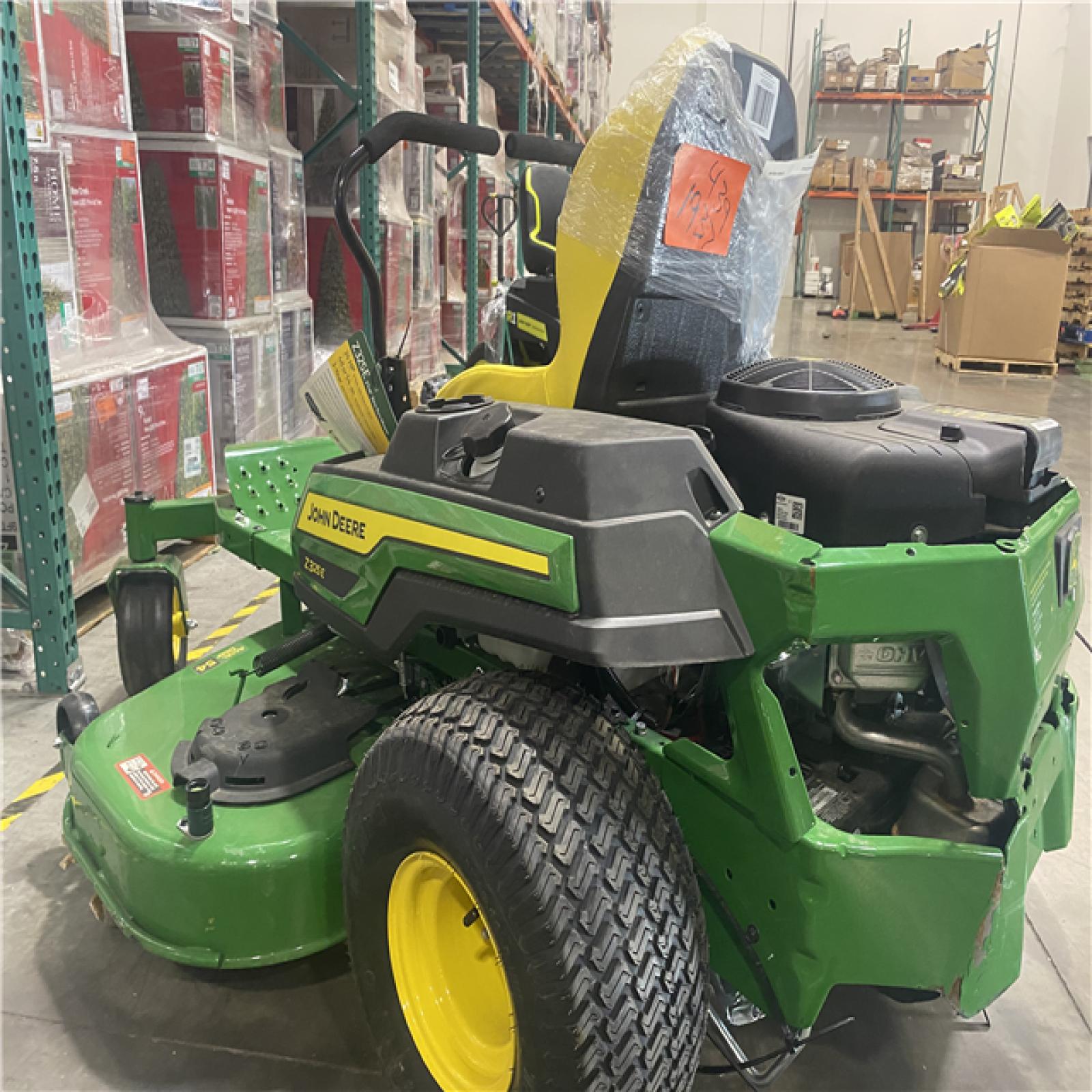 Dallas Location - As-Is John Deere Z325E 48 in. 24 HP Gas  Zero Turn Riding Lawn Mower