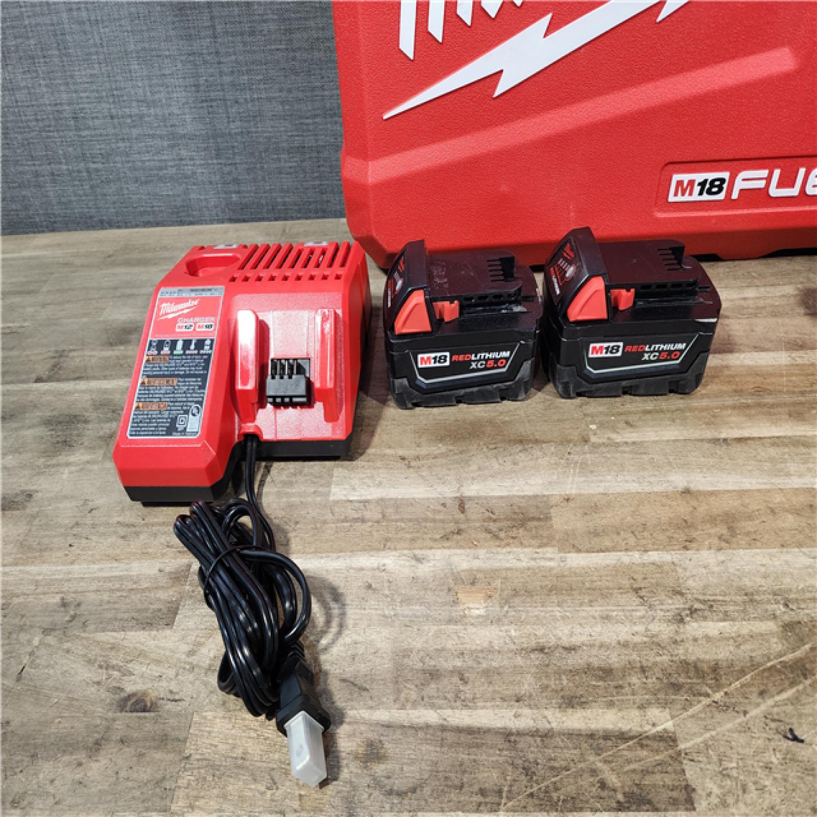 HOUSTON LOCATION - AS-IS Milwaukee FUEL 18V Lithium-Ion Brushless Cordless Hammer Drill and Impact Driver Combo Kit