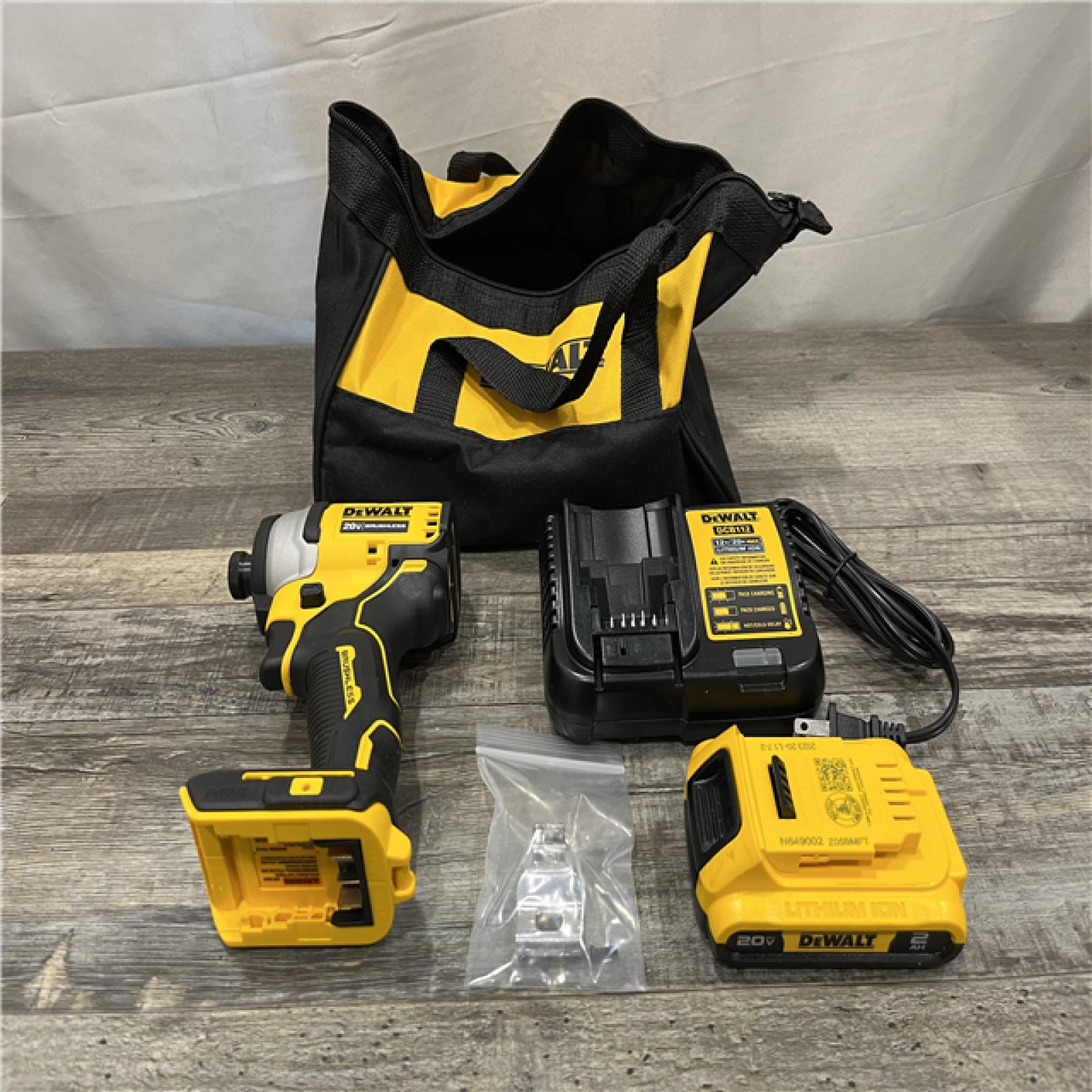 AS-IS DEWALT Atomic 20V Max Lithium-Ion Brushless Cordless Compact 1/4 in. Impact Driver Kit