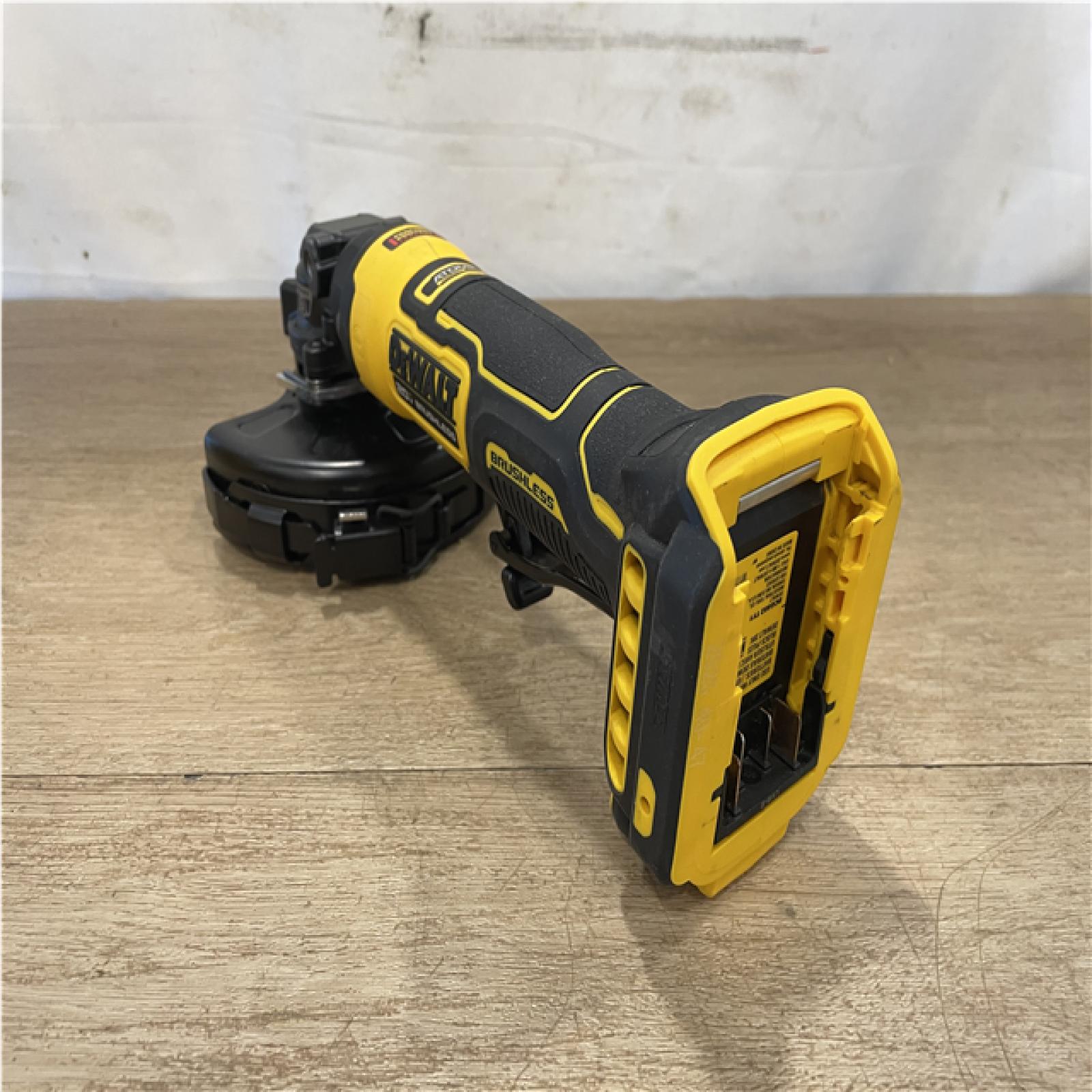 AS-IS DEWALT ATOMIC 20V MAX Cordless 4-1/2 in. Angle Grinder with Paddle Switch (Tool Only)