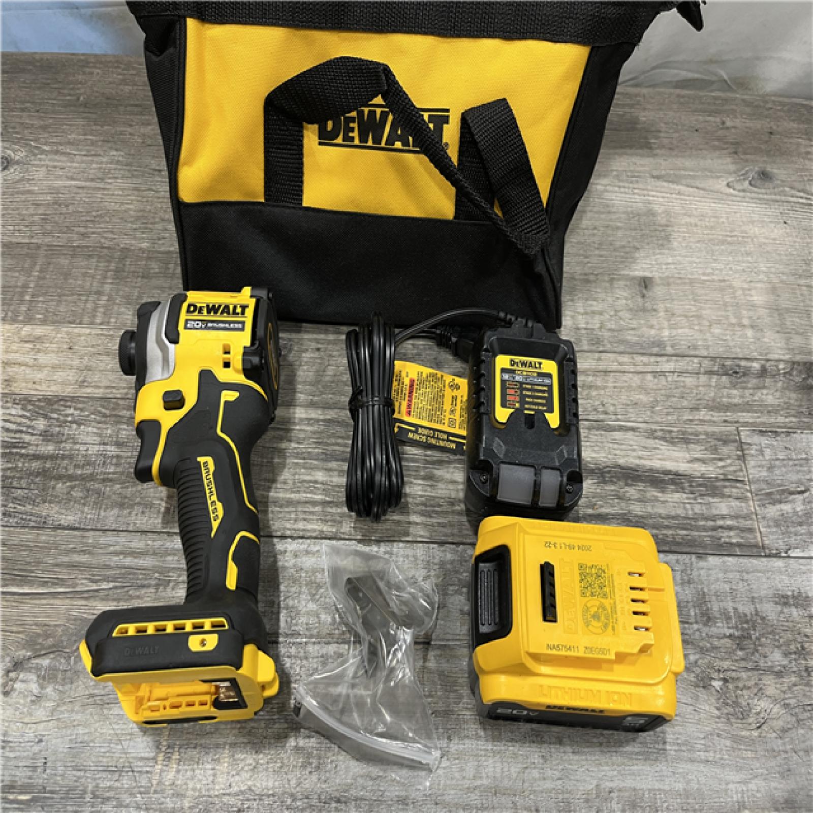 AS-IS DEWALT ATOMIC 20V MAX Lithium-Ion Cordless 1/4 in. Brushless Impact Driver Kit