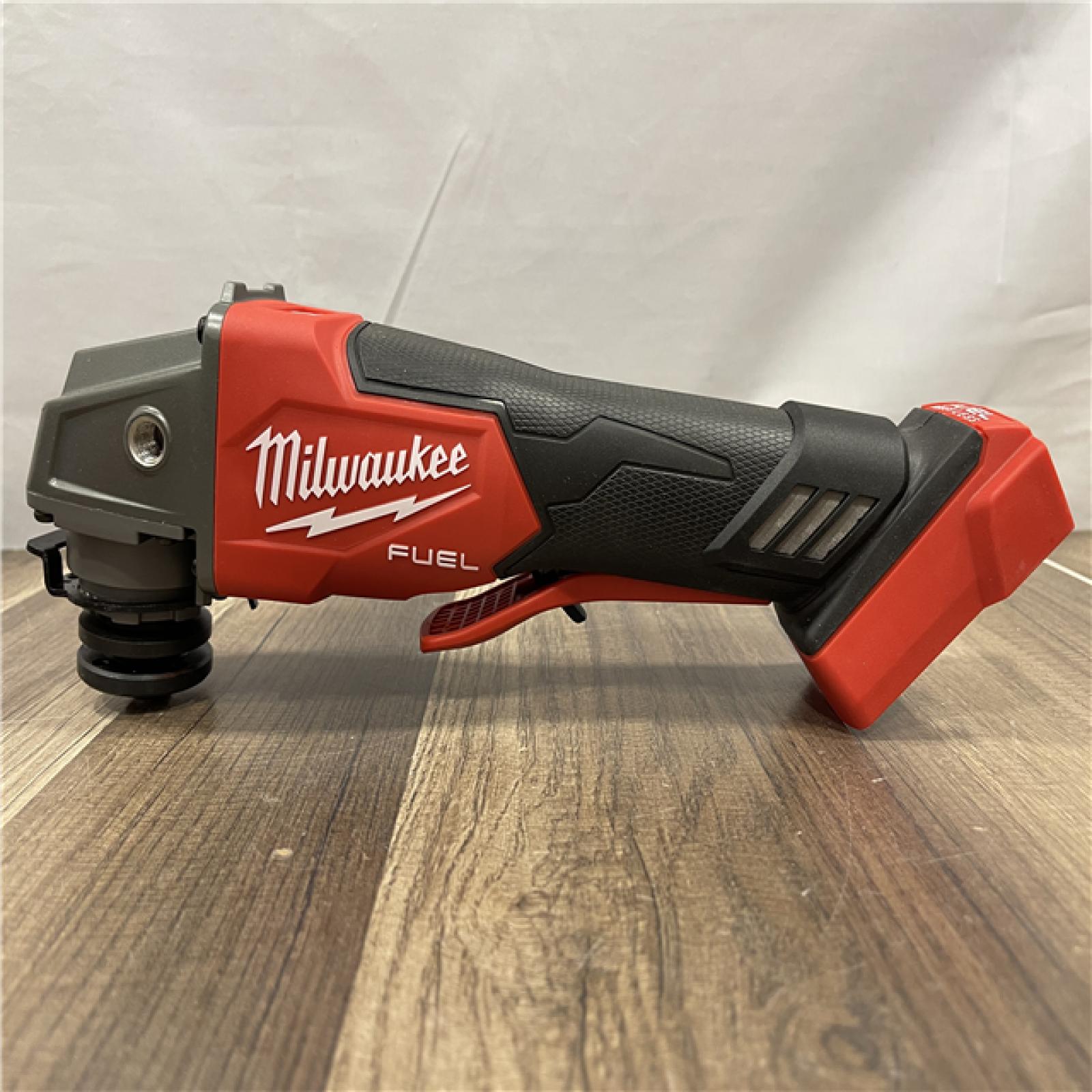 AS-IS Milwaukee FUEL 18V Lithium-Ion Brushless Cordless 4-1/2 in./5 in. Grinder w/Paddle Switch (Tool-Only)