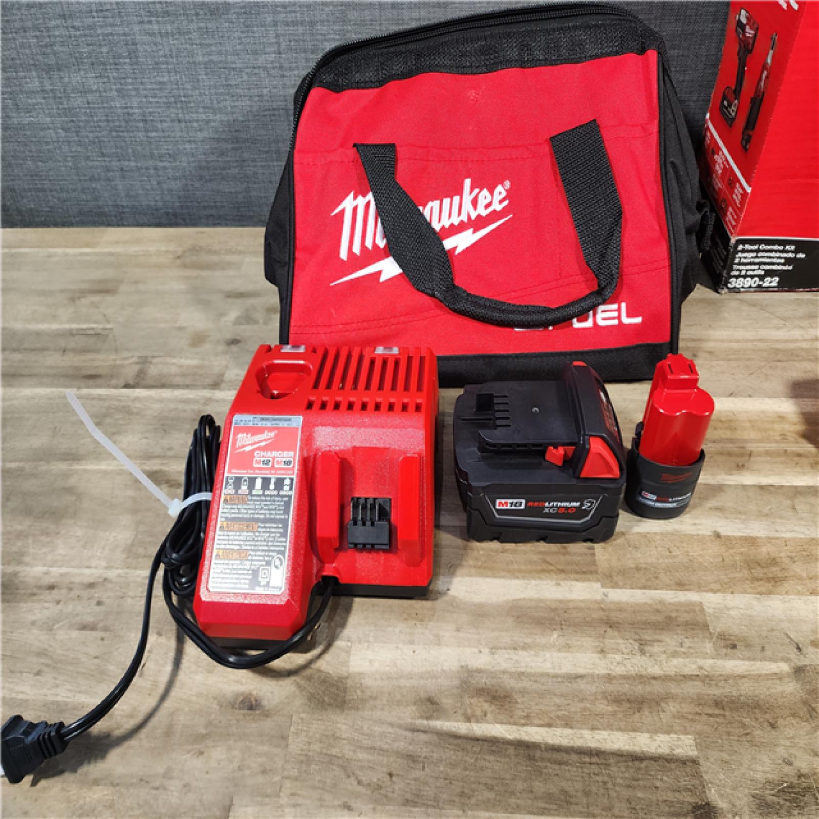 HOUSTON LOCATION - AS-IS (APPEARS LIKE NEW) M18 FUEL 18V Cordless Mid Torque 1/2 in. Impact Wrench W/ M12 FUEL 3/8 in. Ratchet & Battery/Charger Combo Kit