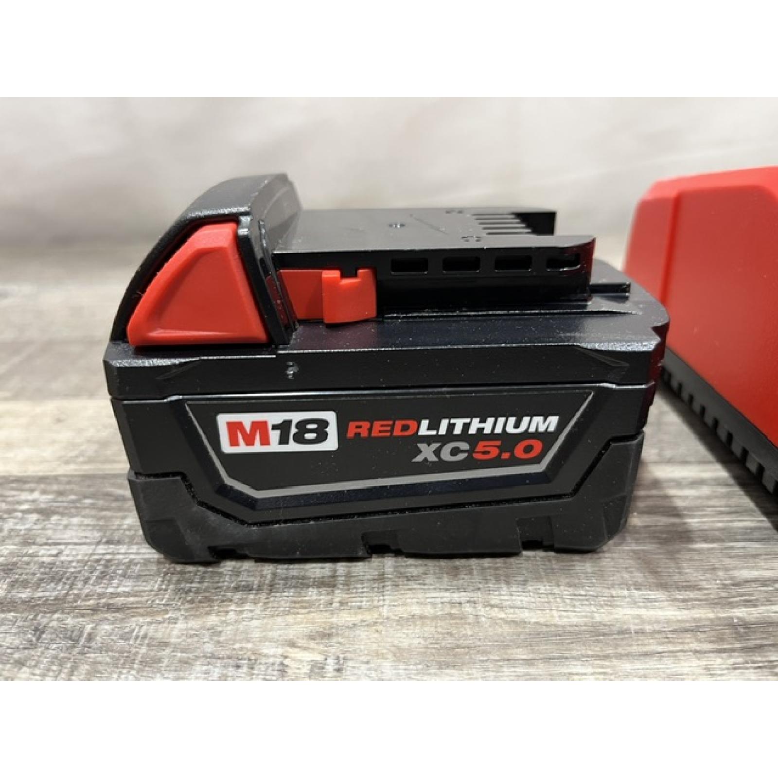 AS-IS Milwaukee 18-Volt Lithium-Ion XC Starter Kit with One 5.0Ah Battery and Charger