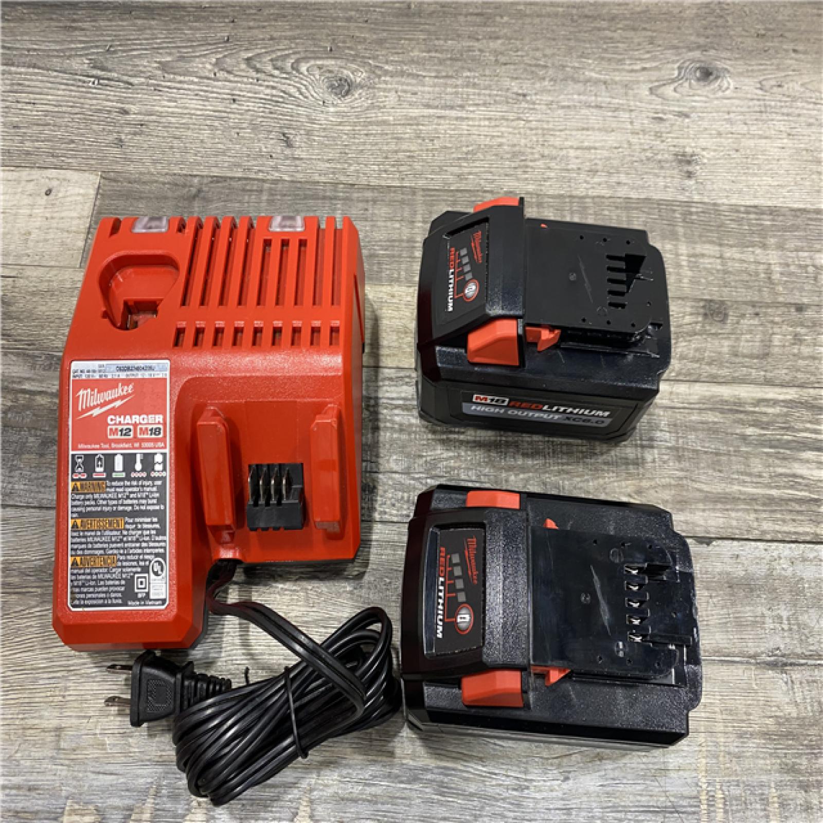 AS-IS Milwaukee 18-Volt Lithium-Ion High Output Battery Starter Kit with Two 6.0 Ah Battery and Charger