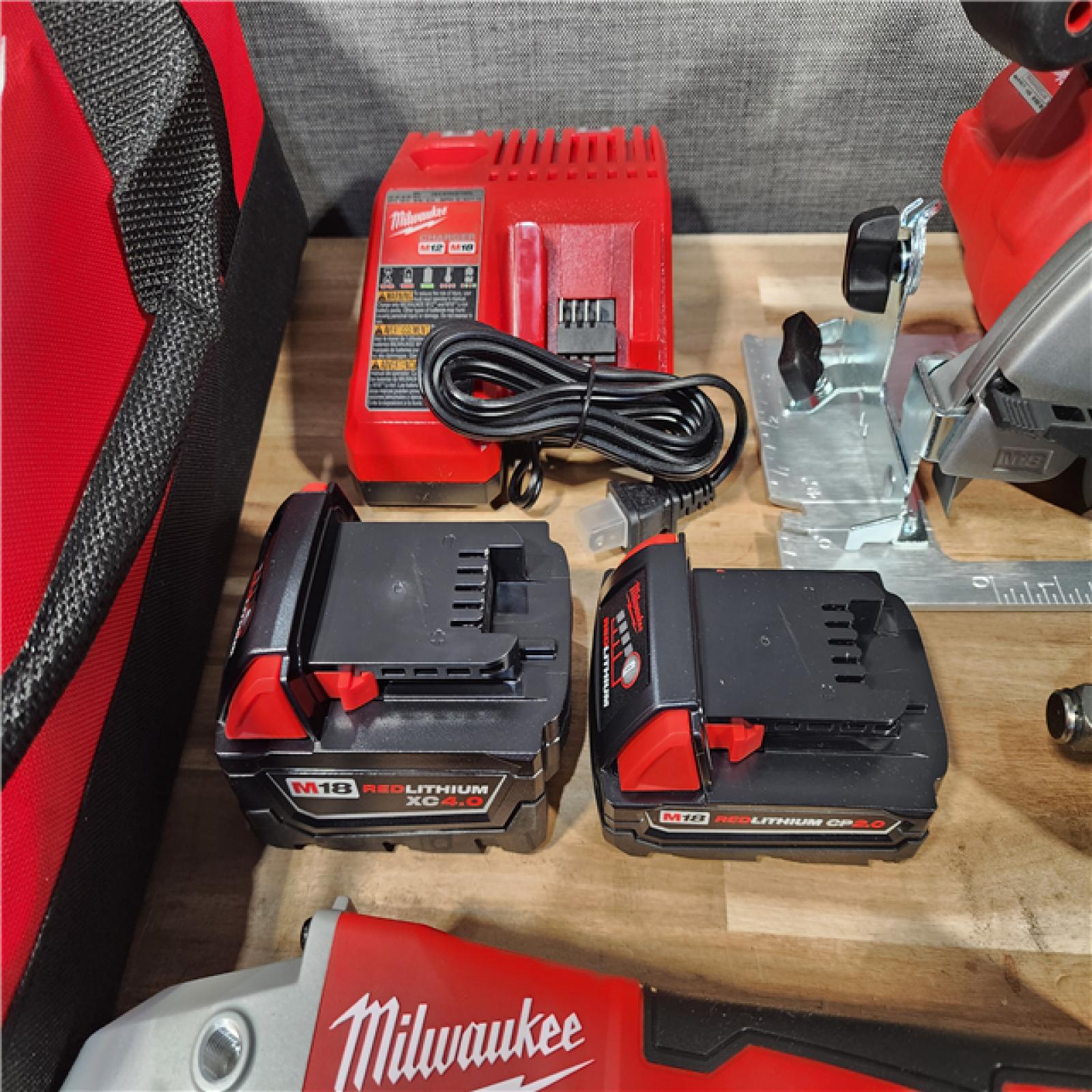 HOUSTON LOCATION - AS-IS (APPEARS LIKE NEW) M18 18-Volt Lithium-Ion Cordless Combo Kit 9-Tool with 2-Batteries  Charger and Tool Bag