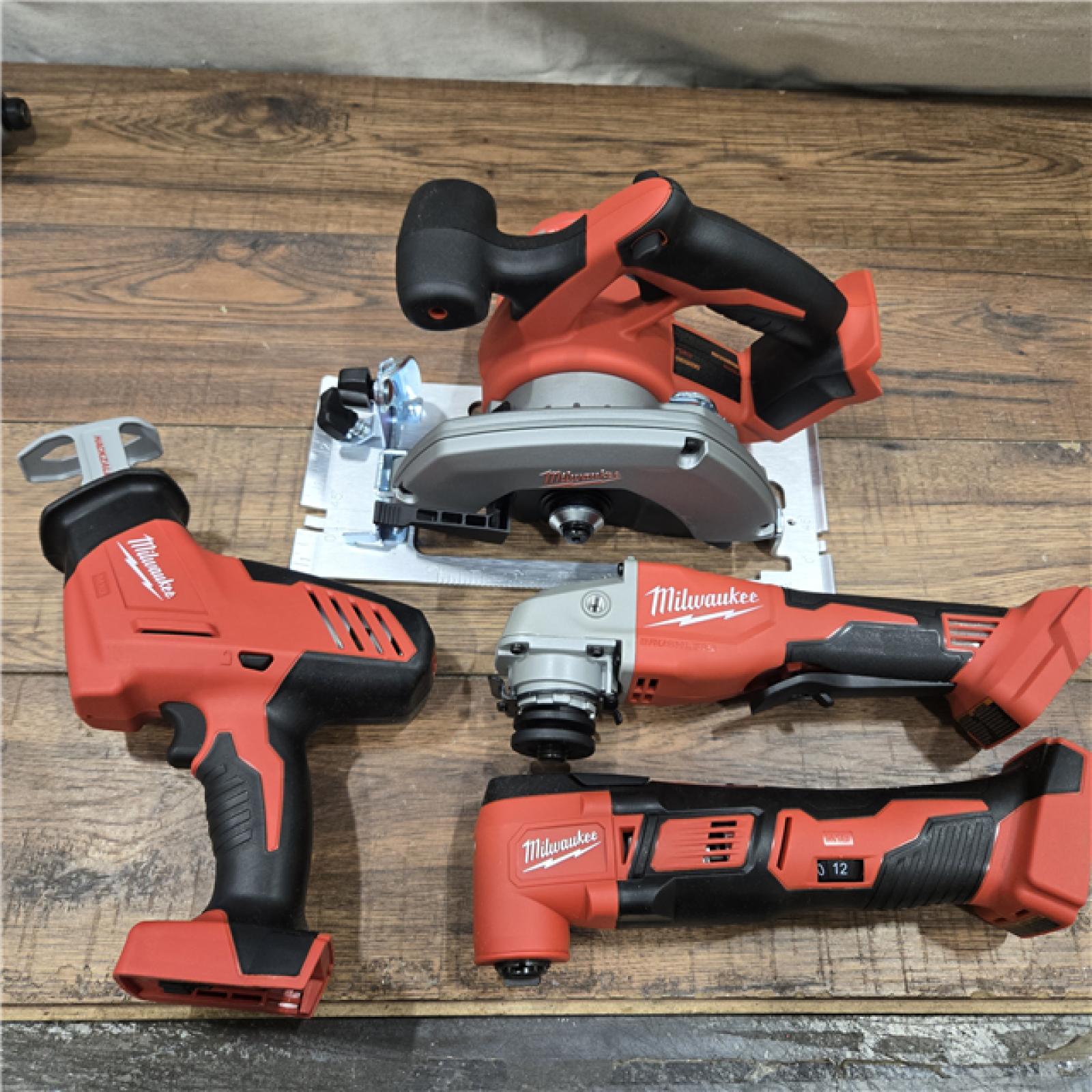 GOOD- Milwaukee M18 18-Volt Lithium-Ion Cordless Combo Kit 7-Tool with 2-Batteries, Charger and Tool Bag