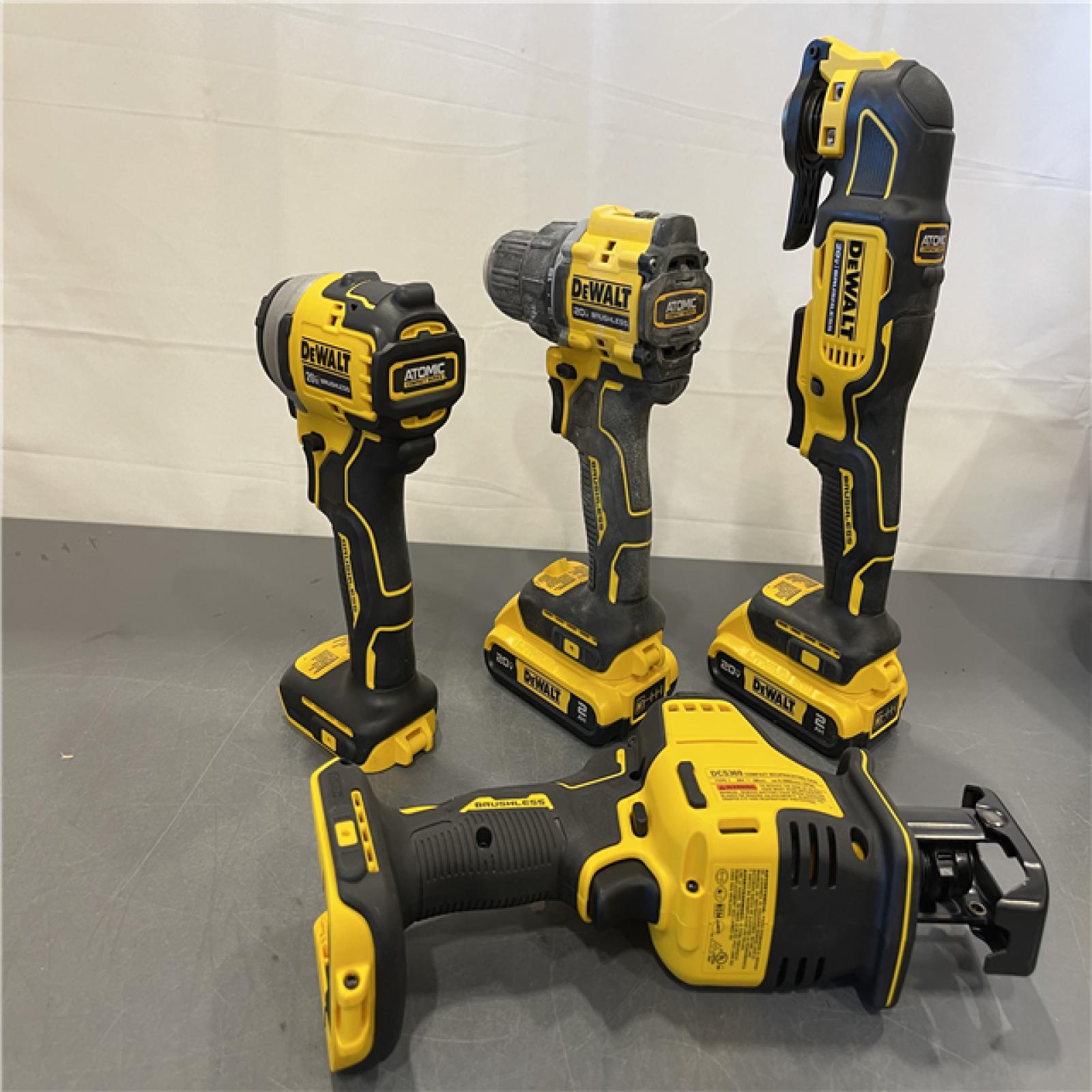 AS-IS - DeWalt 20V MAX ATOMIC Cordless Brushless 4 Tool Combo Kit