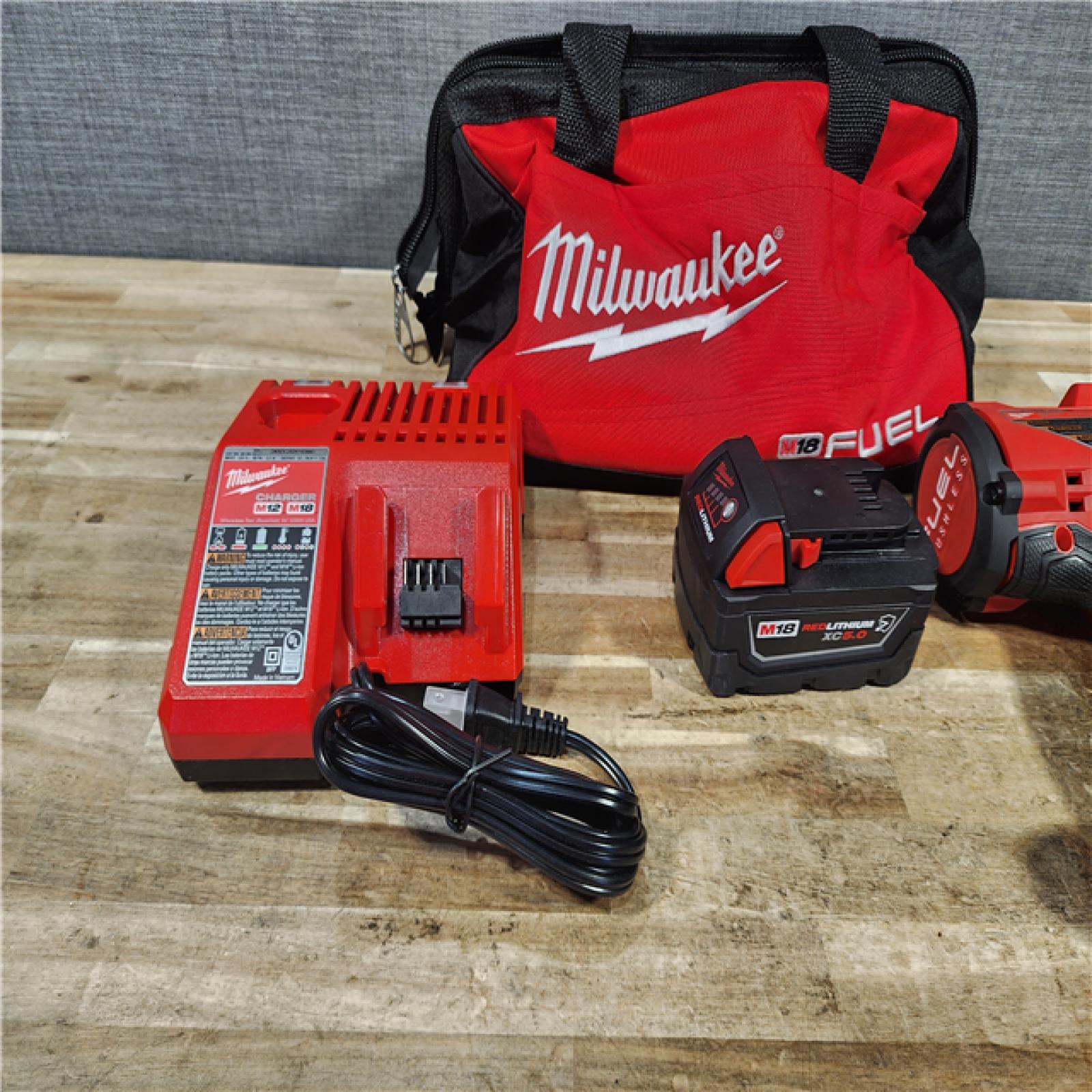 HOUSTON LOCATION - AS - IS Milwaukee FUEL 18V Lithium-Ion Brushless Cordless 1/2 in. Impact Wrench w/ BAG KIT