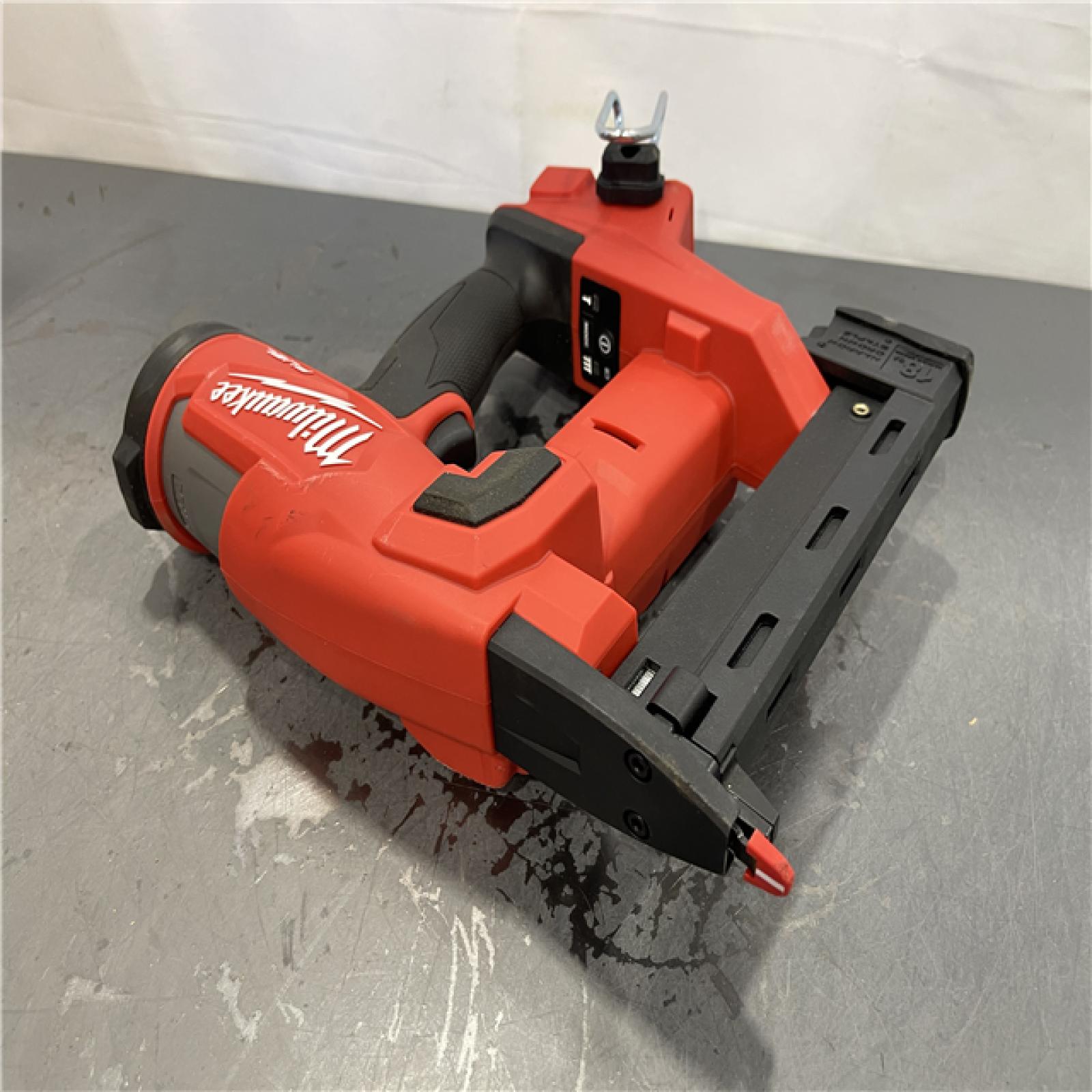 AS-IS - MILWAUKEE M18 FUEL 18-Volt Lithium-Ion Brushless Cordless 18-Gauge 1/4 in. Narrow Crown Stapler