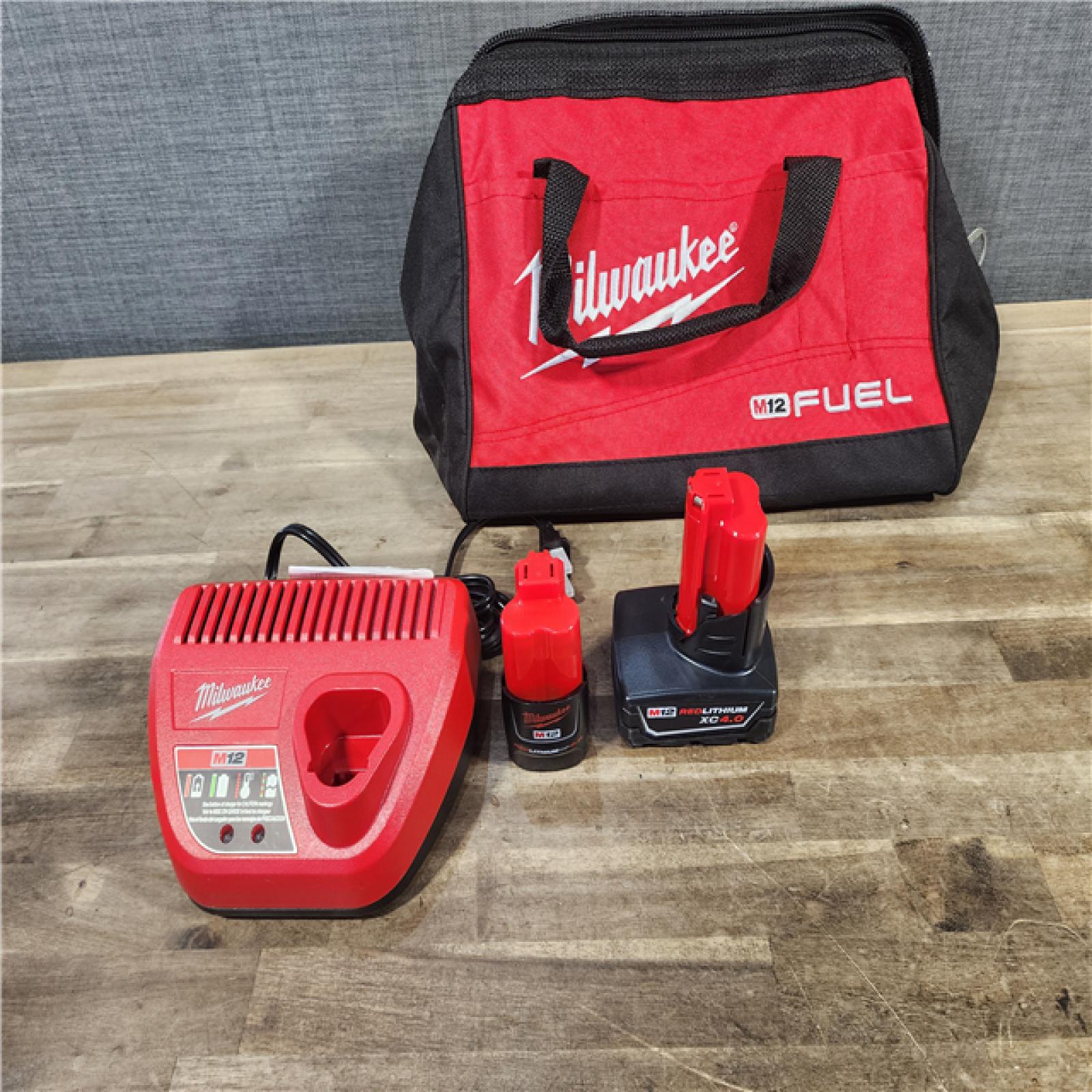 HOUSTON LOCATION - AS-IS (APPEARS LIKE NEW) Milwaukee 3497-22 12V Brushless Hammer Drill and Impact Driver Combo Kit