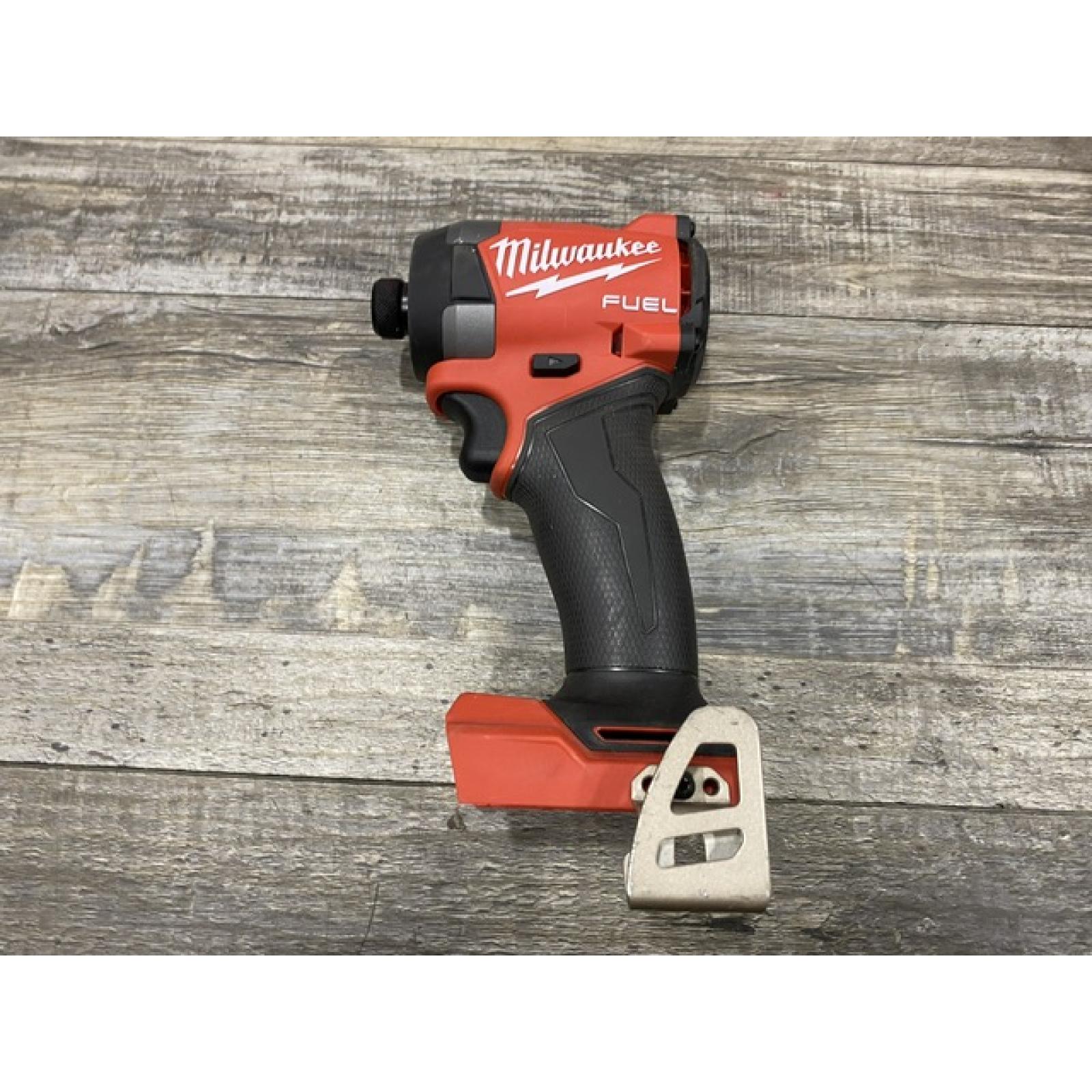 AS-IS Milwaukee FUEL 18V Lithium-Ion Brushless Cordless 1/4 in. Hex Impact Driver Kit