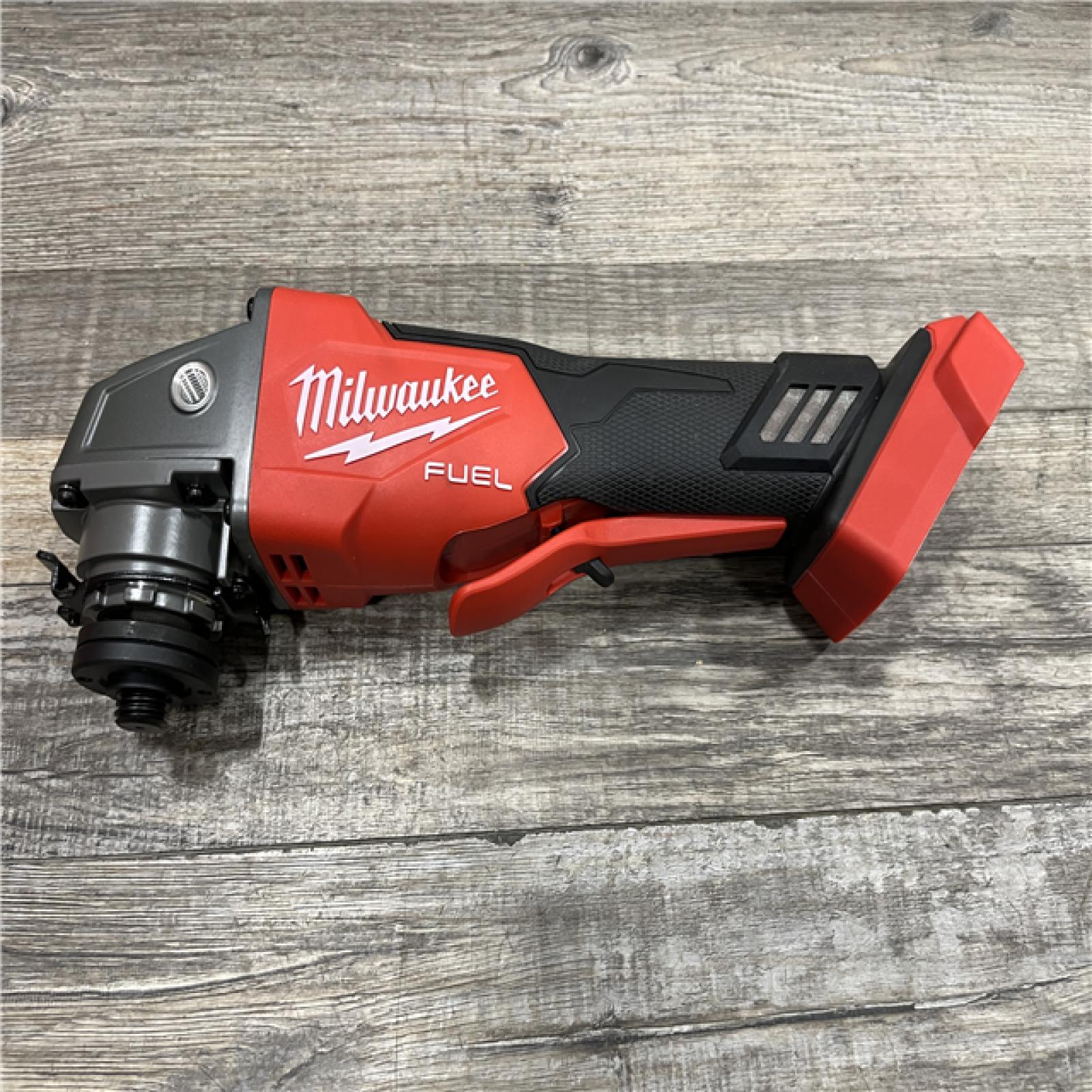 AS-IS Milwaukee FUEL 18V Lithium-Ion Brushless Cordless 4-1/2 in./5 in. Grinder w/Paddle Switch (Tool-Only)