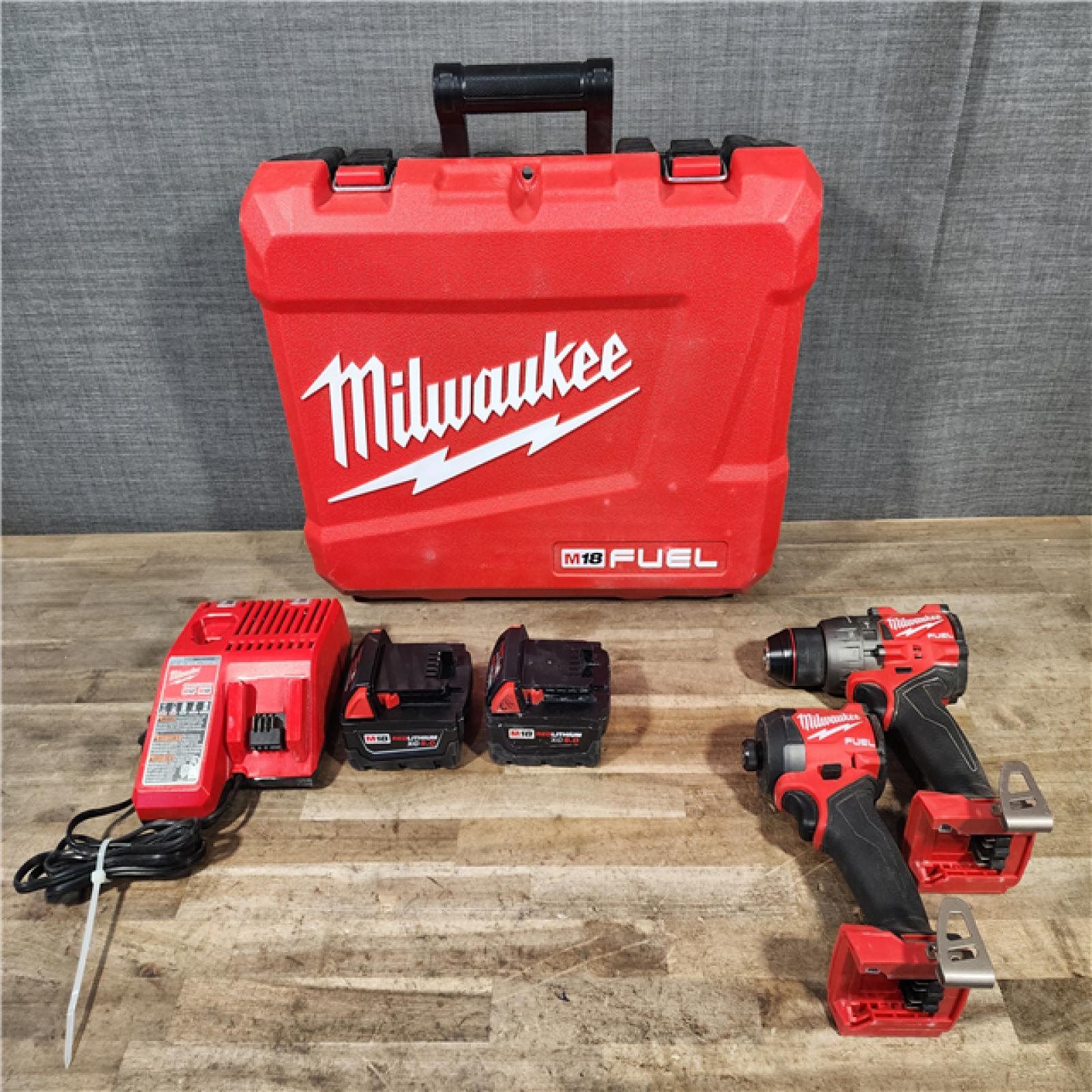 HOUSTON LOCATION - AS-IS Milwaukee FUEL 18V Lithium-Ion Brushless Cordless Hammer Drill and Impact Driver Combo Kit