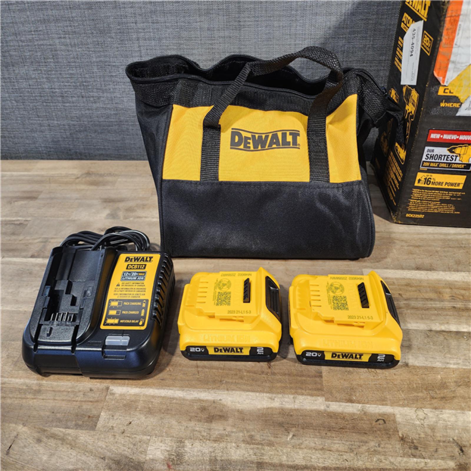HOUSTON LOCATION - AS-IS Dewalt DCK225D2 20V MAX ATOMIC Brushless Compact Lithium-Ion 1/2 in. Cordless Drill Driver and 1/4 in. Impact Driver Combo Kit with 2 Batteries 2 Ah