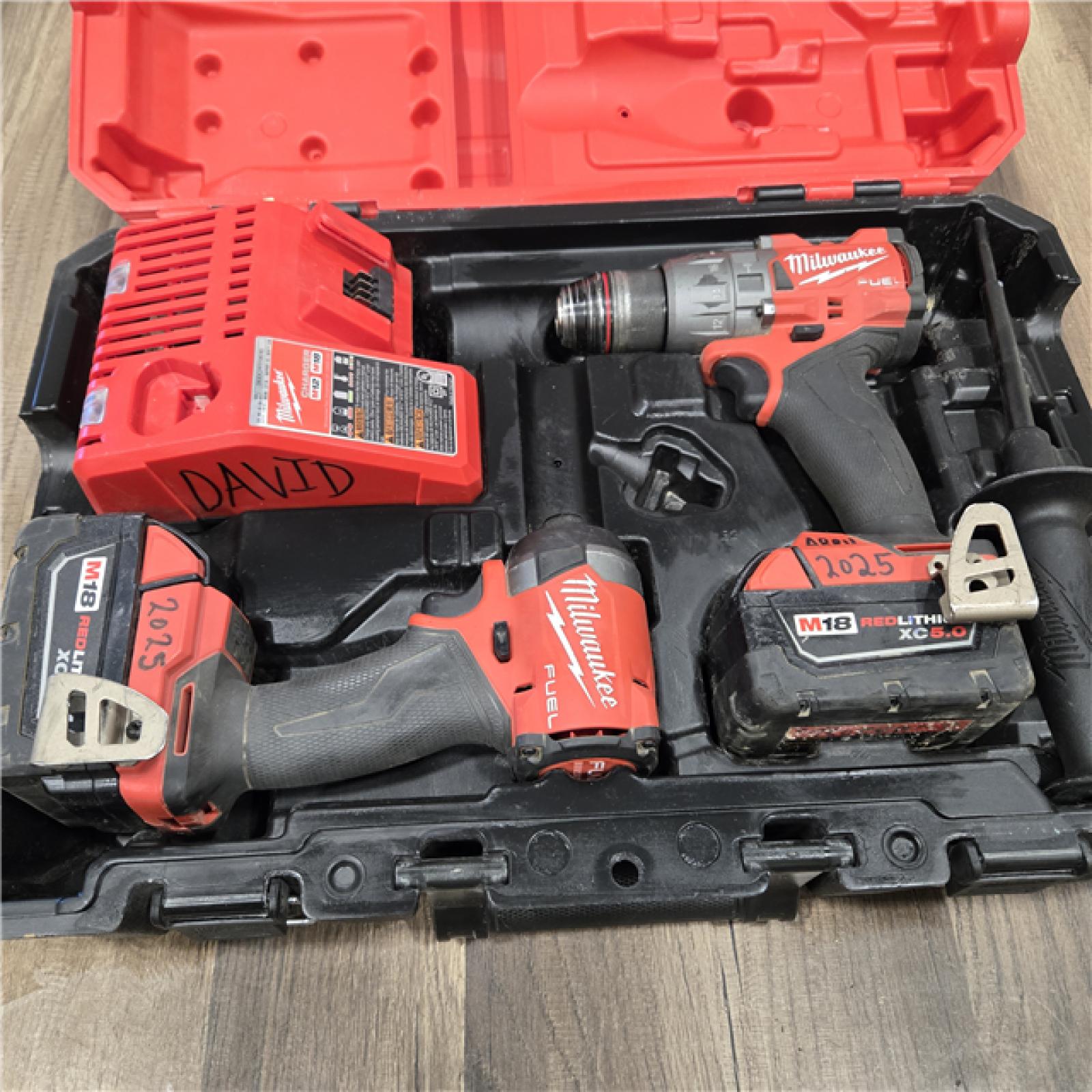AS-IS MILWAUKEE FUEL 18V Lithium-Ion Brushless Cordless Hammer Drill and Impact Driver Combo Kit (2-Tool) with 2 Batteries