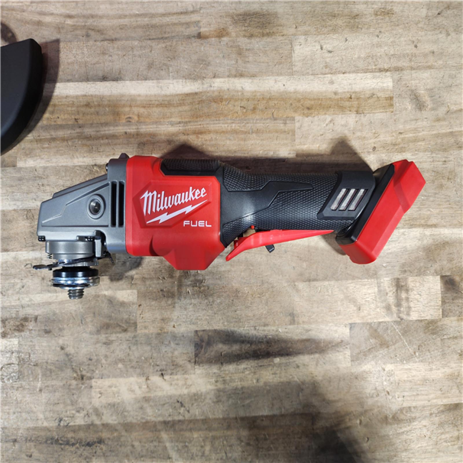 HOUSTON LOCATION - AS-IS (APPEARS LIKE NEW) Milwaukee 2980-20 M18 Fuel 18 Volt 6 Inch Paddle Switch Grinder (Bare Tool)