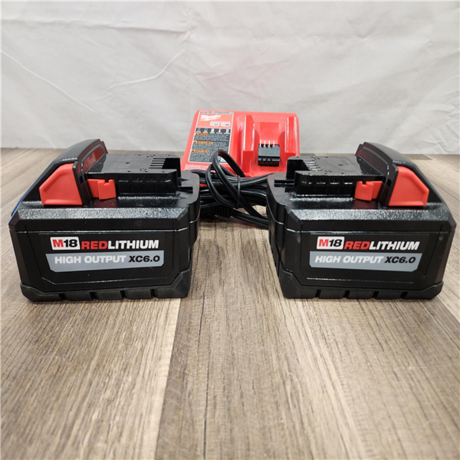 AS-IS Milwaukee M18 18-Volt Lithium-Ion High Output Starter Kit with Two 6.0 Ah Battery and Charger