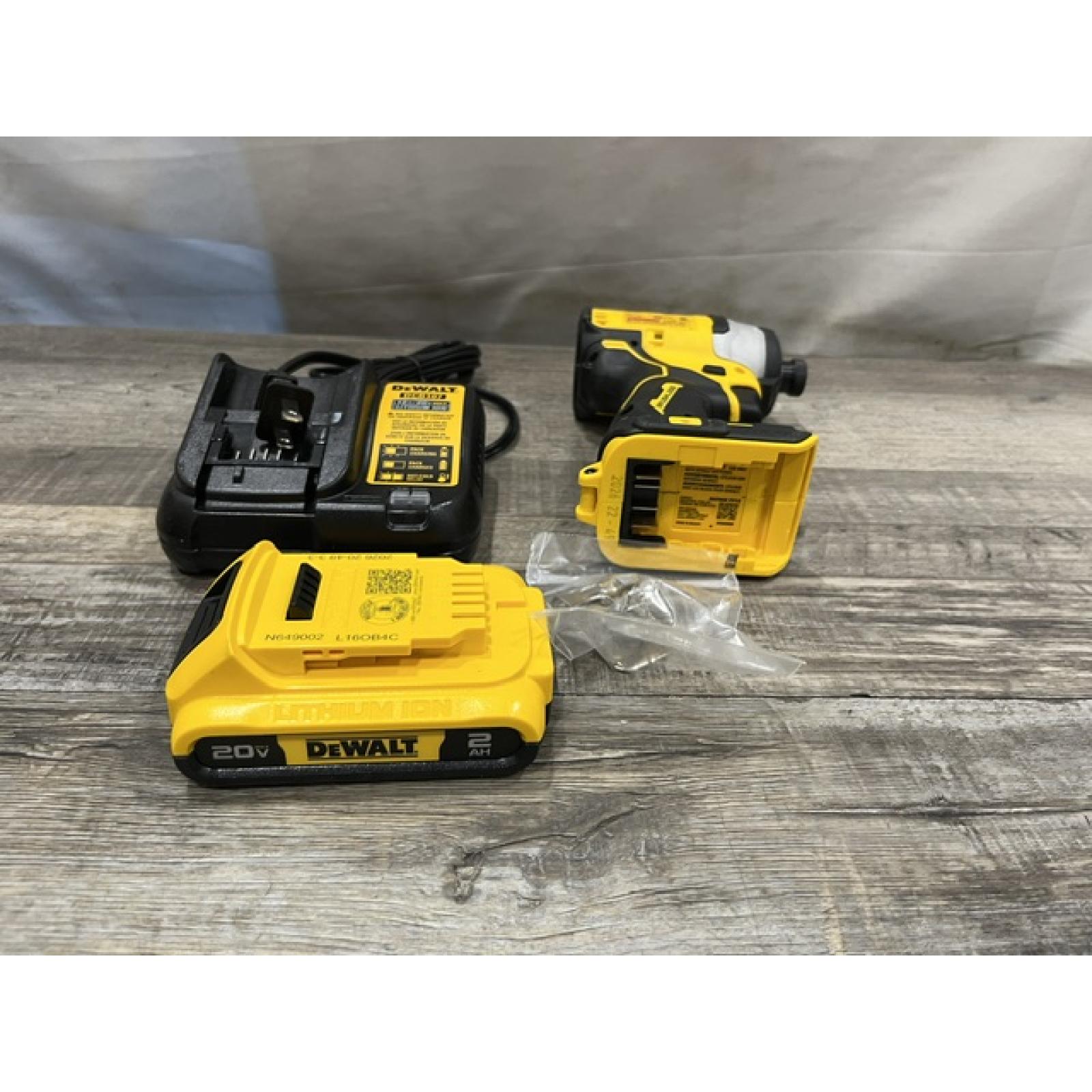 AS-IS DEWALT Atomic 20V Max Lithium-Ion Brushless Cordless Compact 1/4 in. Impact Driver Kit