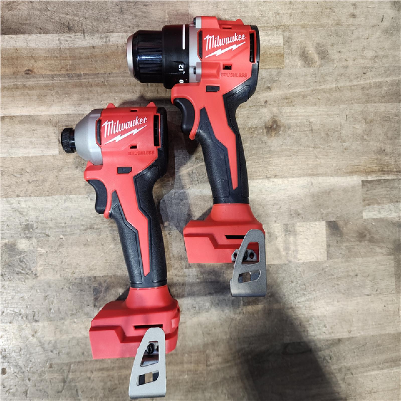 HOUSTON LOCATION - AS-IS Milwaukee M18 18V Lithium-Ion Brushless Cordless Compact Drill/Impact Combo Kit (2-Tool) W/(2) 2.0 Ah Batteries  Charger & Bag