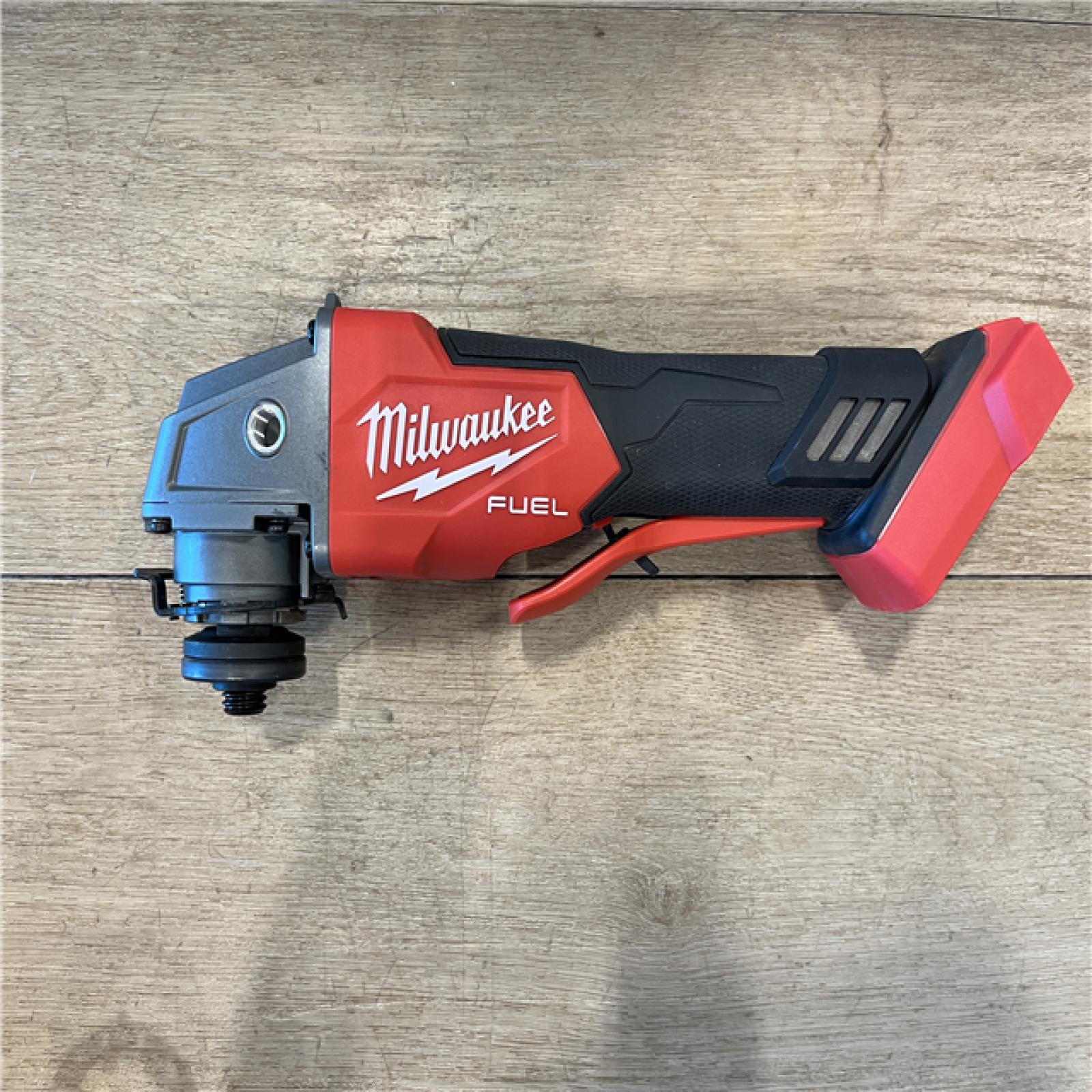 AS-IS Milwaukee FUEL 18V Lithium-Ion Brushless Cordless 4-1/2 in./5 in. Grinder w/Paddle Switch (Tool-Only)