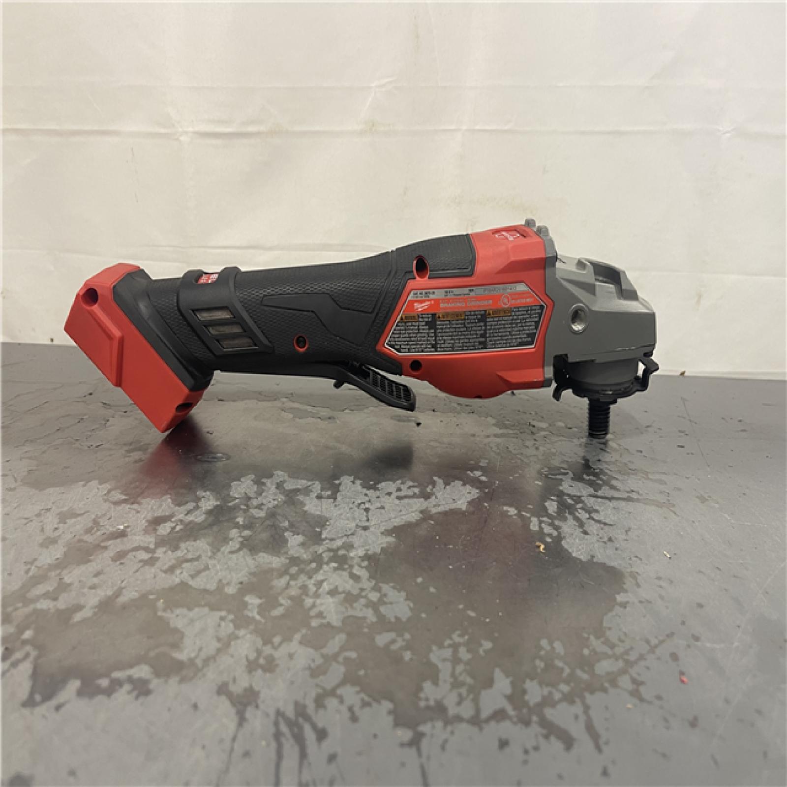AS-IS- Milwaukee M18 FUEL 4-1/2-6 Cordless Braking Grinder  Paddle Switch (Tool-Only)