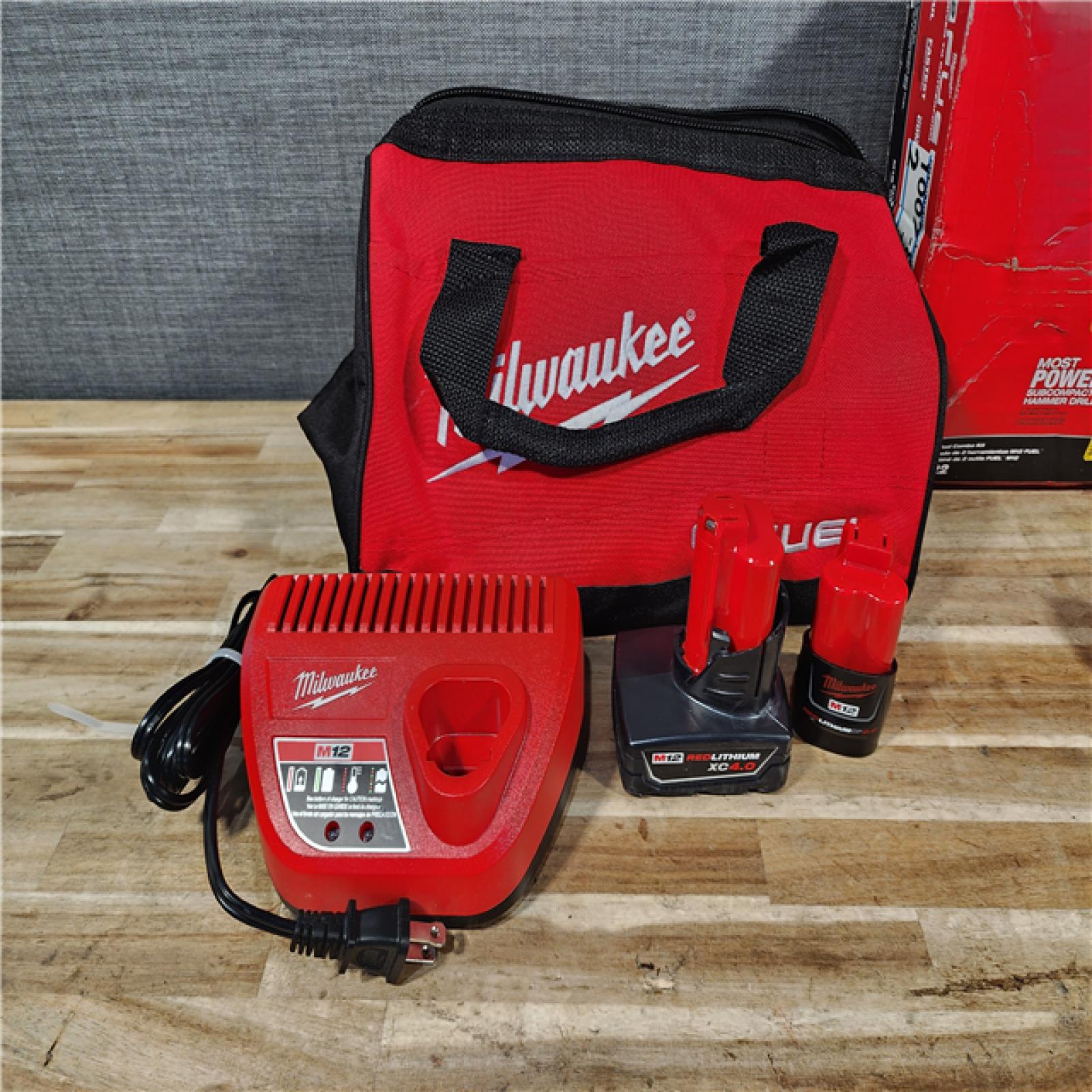 HOUSTON LOCATION - AS-IS Milwaukee  FUEL 12-Volt Lithium-Ion Brushless Cordless Hammer Drill and Impact Driver Combo Kit