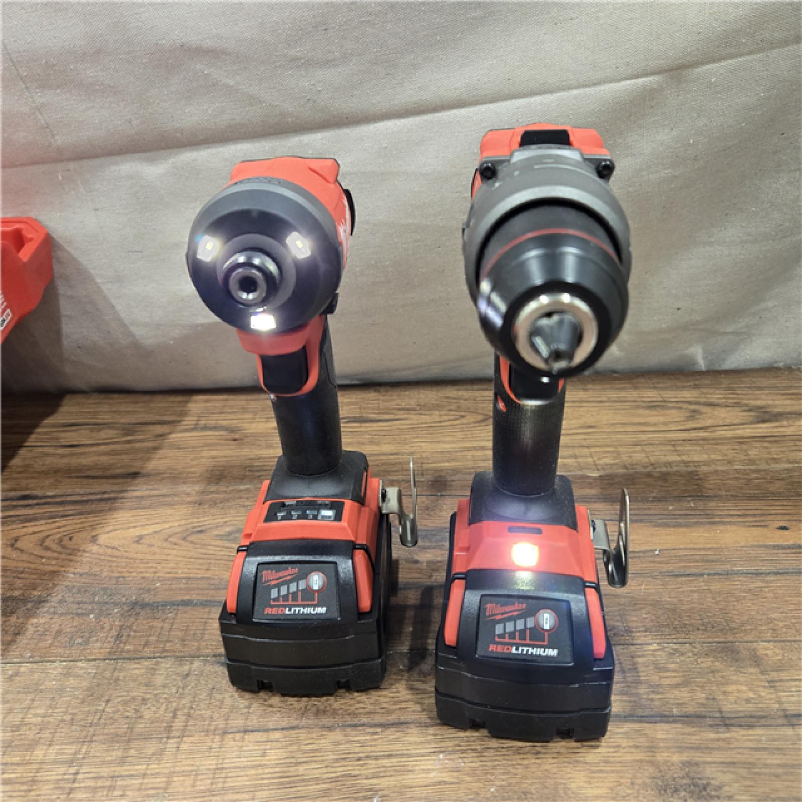 AS-IS MILWAUKEE M18 FUEL 18V Lithium-Ion Brushless Cordless Hammer Drill and Impact Driver Combo Kit (2-Tool) with 2 Batteries