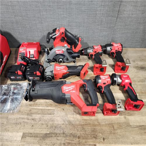 HOUSTON LOCATION - AS-IS Milwaukee M18 FUEL 18V Lithium-Ion Brushless Cordless Combo Kit with Two 5.0 Ah Batteries  1 Charger  2 Tool Bags (7-Tool)