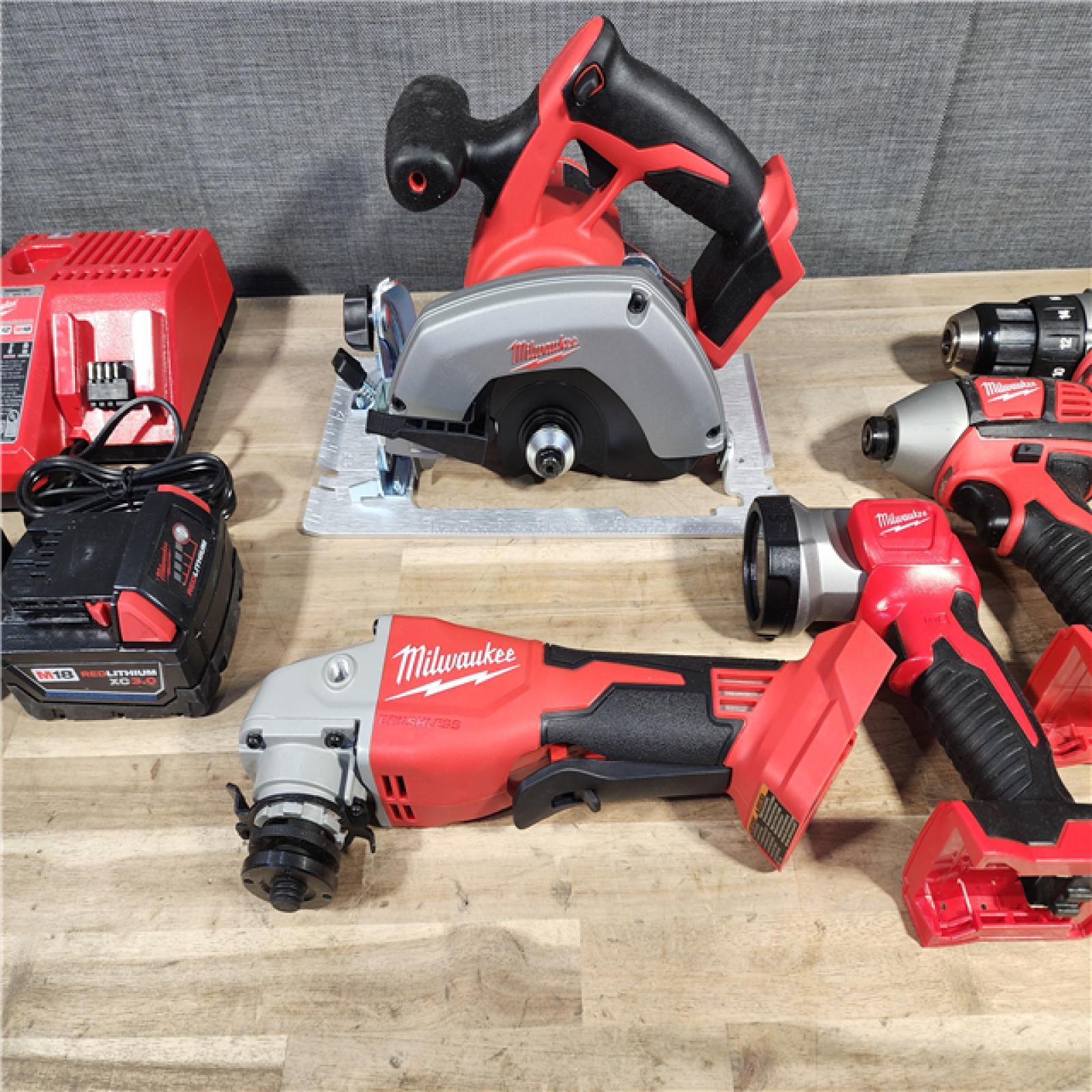 HOUSTON LOCATION - AS-IS Milwaukee M18 18-Volt Lithium-Ion Cordless Combo Kit 5-Tool with 2-Batteries, Charger and Tool Bag