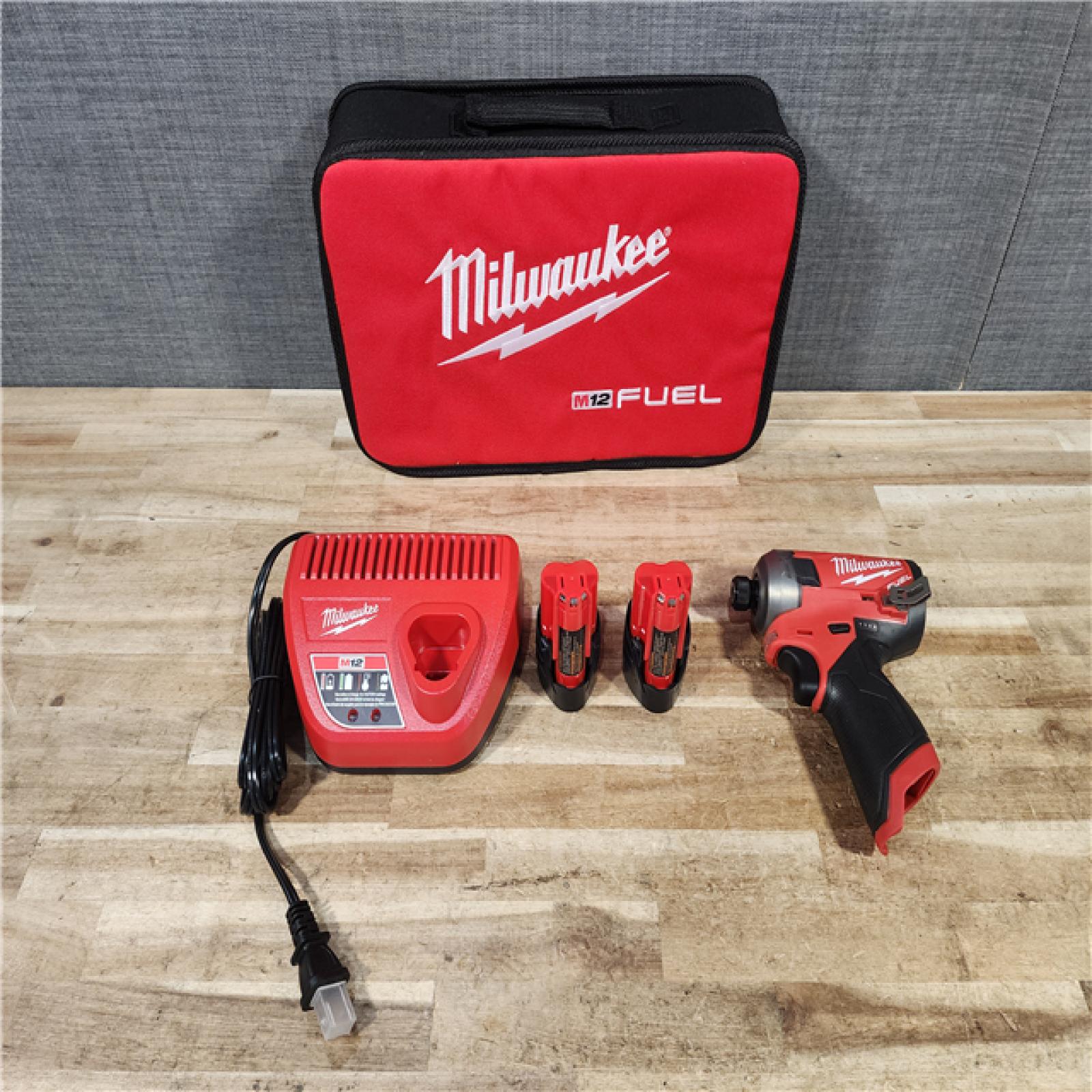 HOUSTON LOCATION - AS - IS Milwaukee FUEL SURGE 12V Lithium-Ion Brushless Cordless 1/4 in. Hex Impact Driver Compact Kit