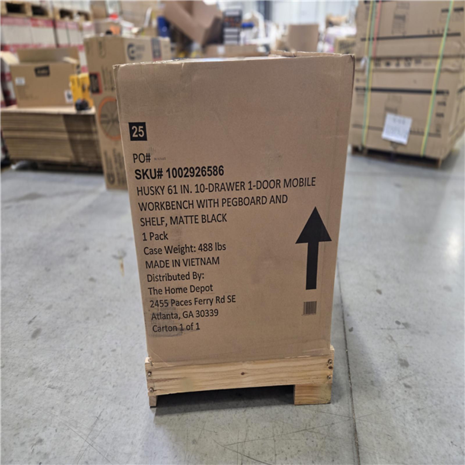 DALLAS LOCATION - AS-IS Husky 61 in. W x 26 in. D Heavy Duty 10-Drawer 1-Door Mobile Workbench with Hardwood Top  Pegboard and Shelf in Matte Black
