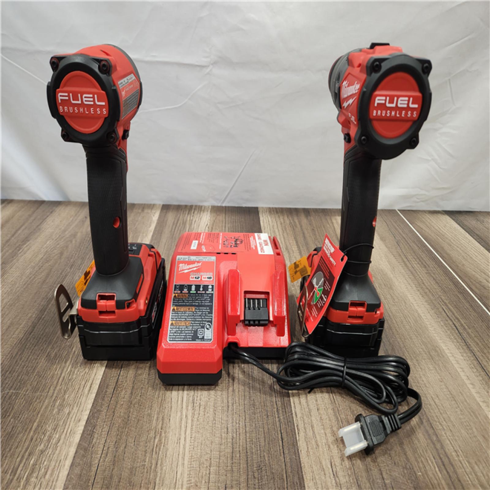 AS-IS- MILWAUKEE FUEL 18V Lithium-Ion Brushless Cordless Hammer Drill and Impact Driver Combo Kit