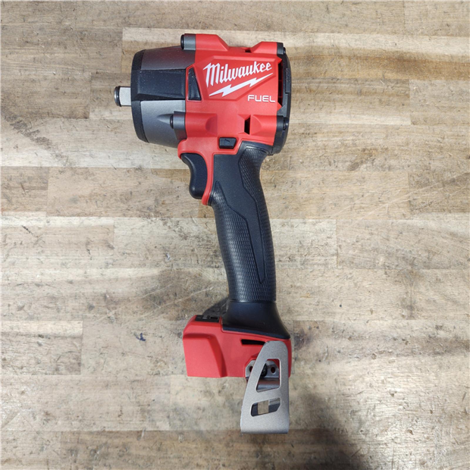 HOUSTON LOCATION - AS-IS Milwaukee M18 18V Fuel 1/2  Mid-Torque Impact Wrench Cordless Lithium-Ion Brushless with Friction Ring 2962-20 (TOOL ONLY)