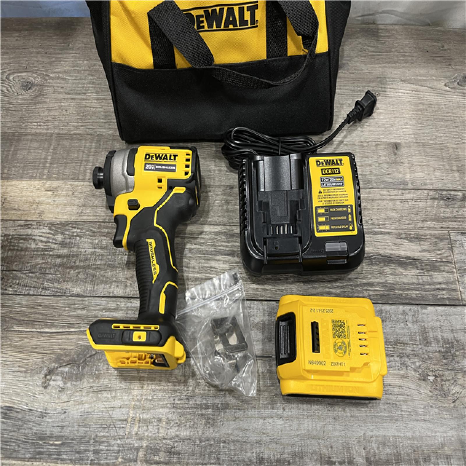 AS-IS DEWALT Atomic 20V Max Lithium-Ion Brushless Cordless Compact 1/4 in. Impact Driver Kit
