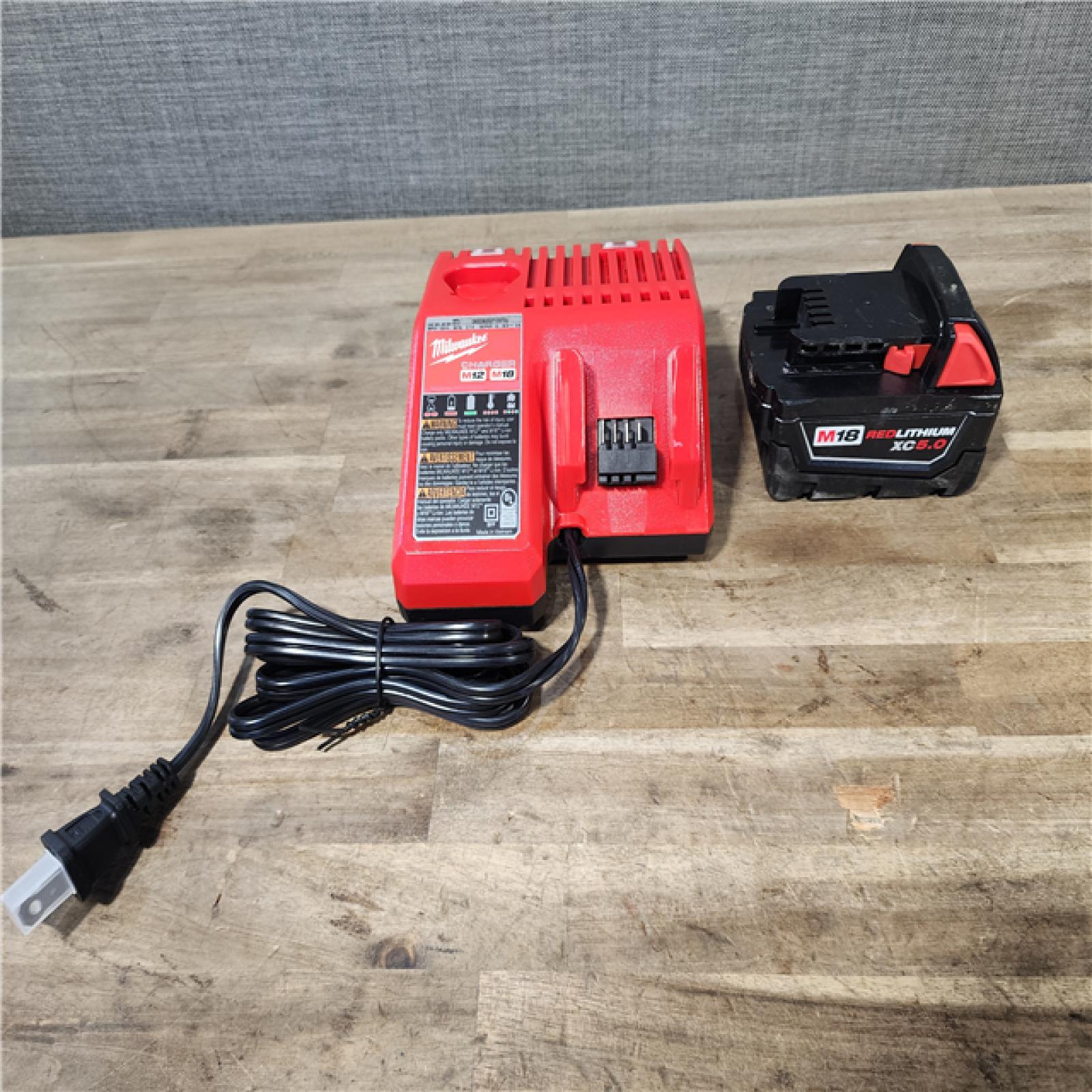 HOUSTON LOCATION - AS-IS Milwaukee 2962-20 M18 18V Fuel 1/2 Mid-Torque Impact Wrench Cordless Lithium-Ion Brushless W/ BATTERY & CHARGER