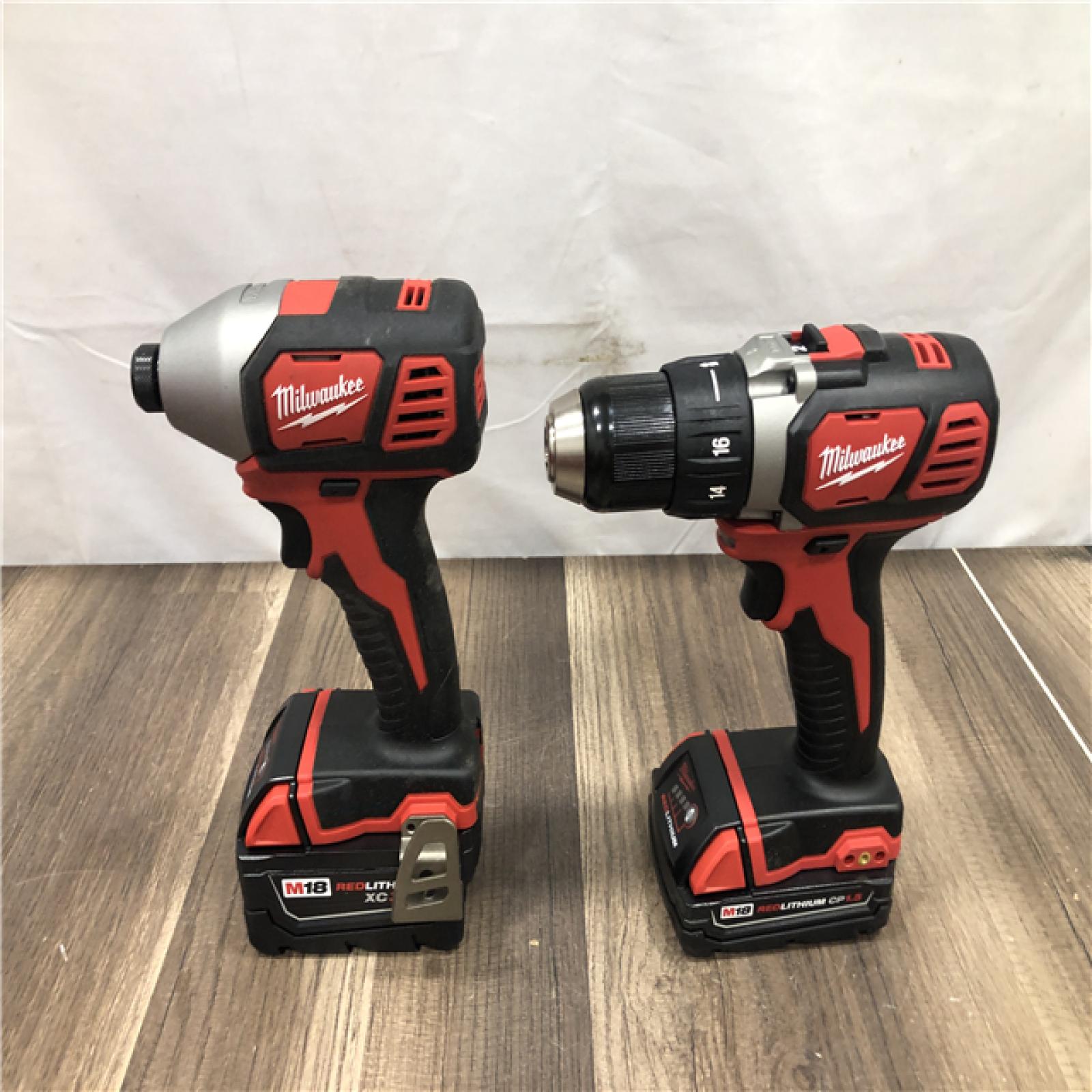 AS-IS Milwaukee M18 18V Lithium-Ion Cordless Drill Driver/Impact Driver Combo Kit
